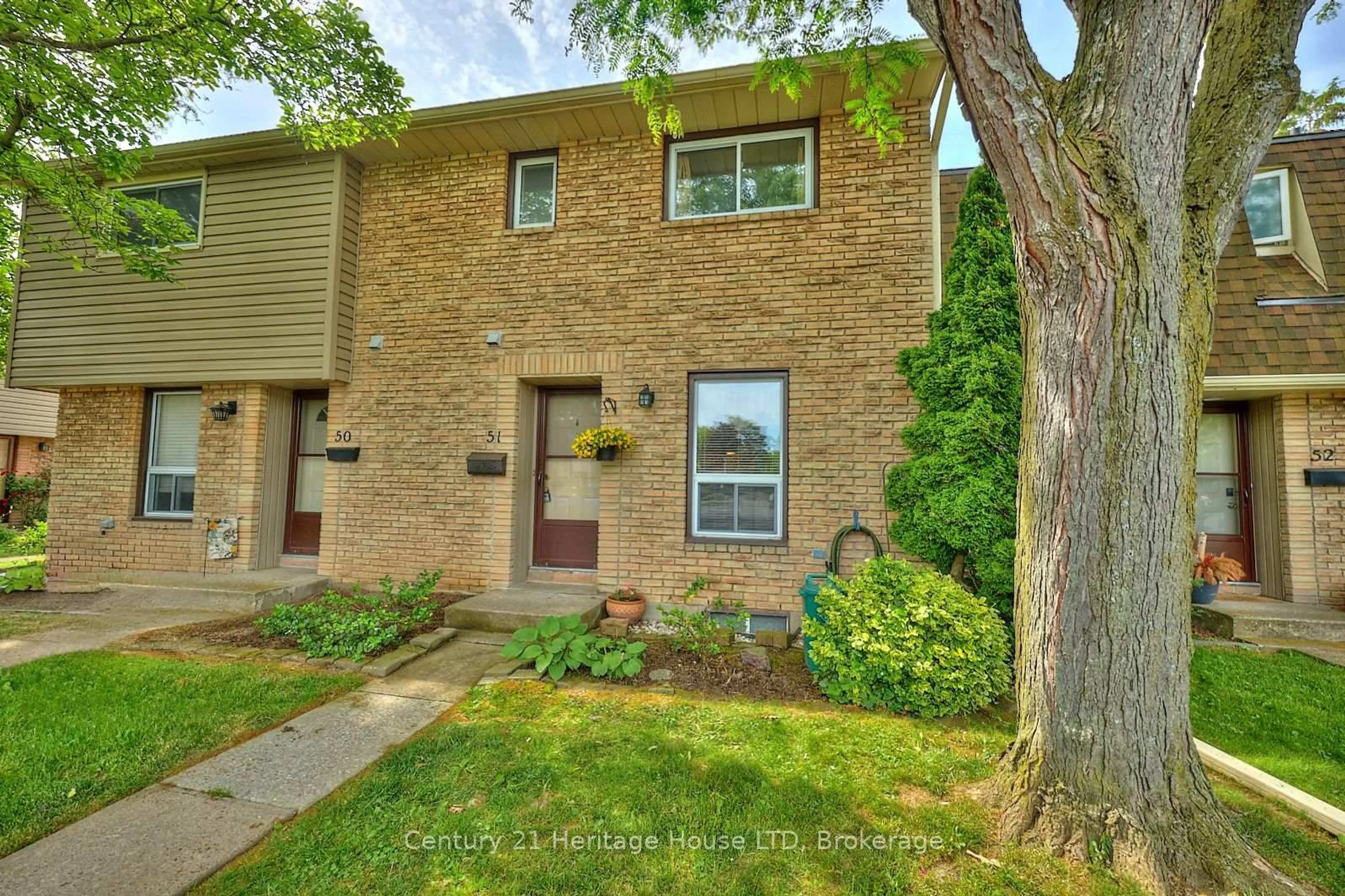 Home with brick exterior material, street for 75 Ventura Dr #51, St. Catharines Ontario L2R 7J7