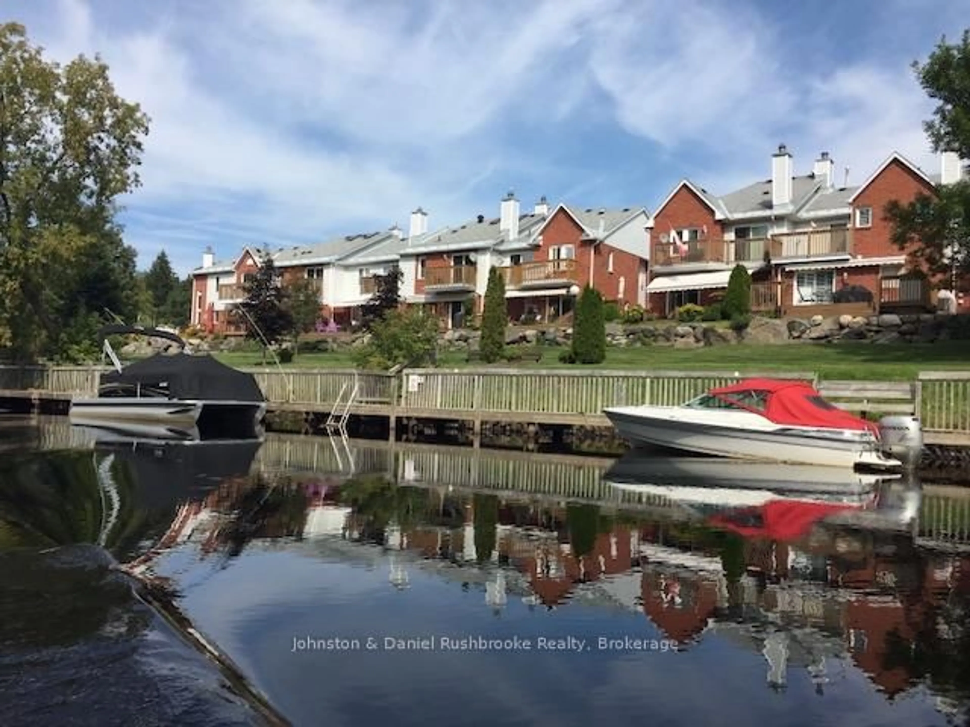 A pic from outside/outdoor area/front of a property/back of a property/a pic from drone, water/lake/river/ocean view for 18 Shoreline Dr, Bracebridge Ontario P1L 1Z4