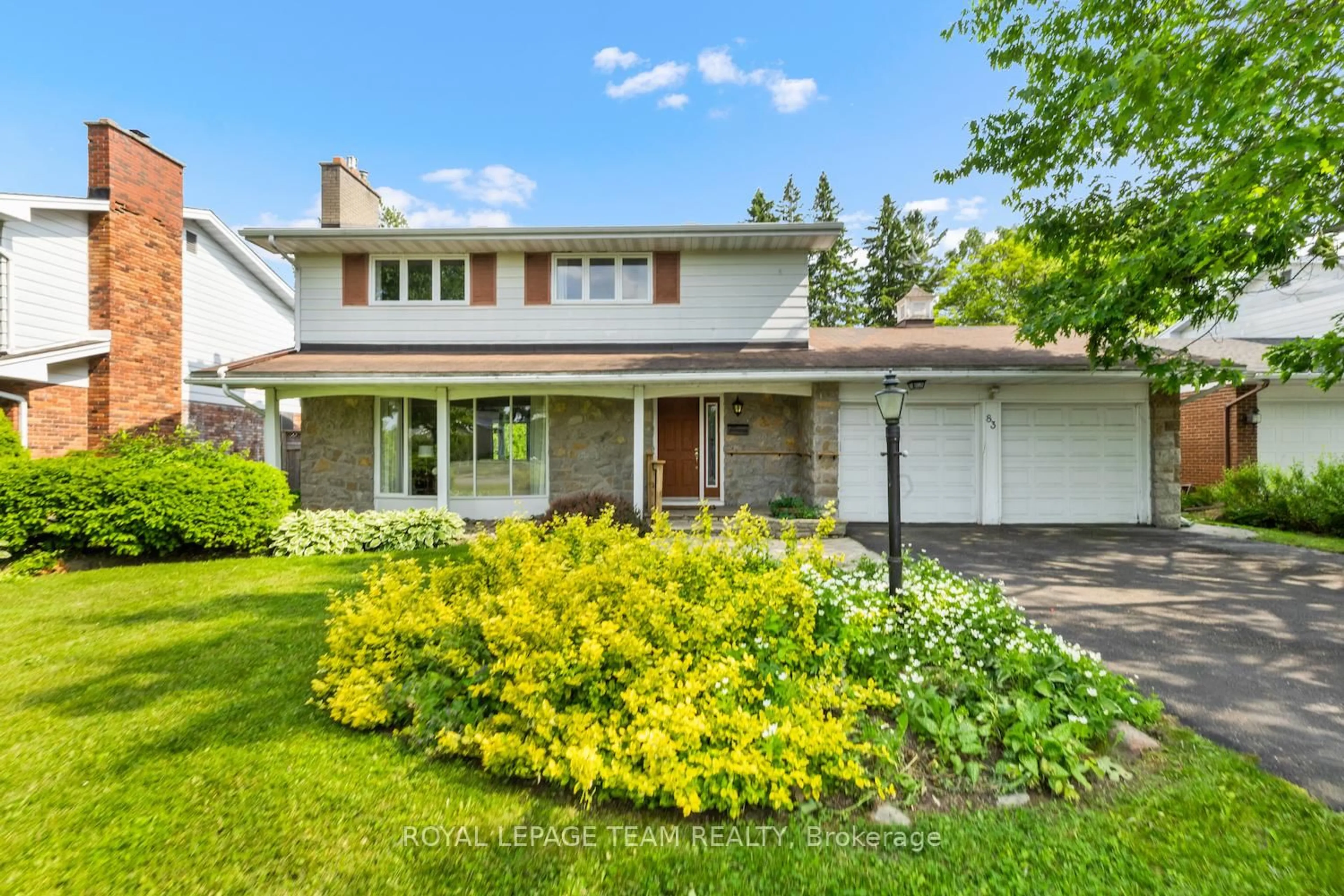 Home with vinyl exterior material, street for 83 Ridgefield Cres, Ottawa Ontario K2H 6T1