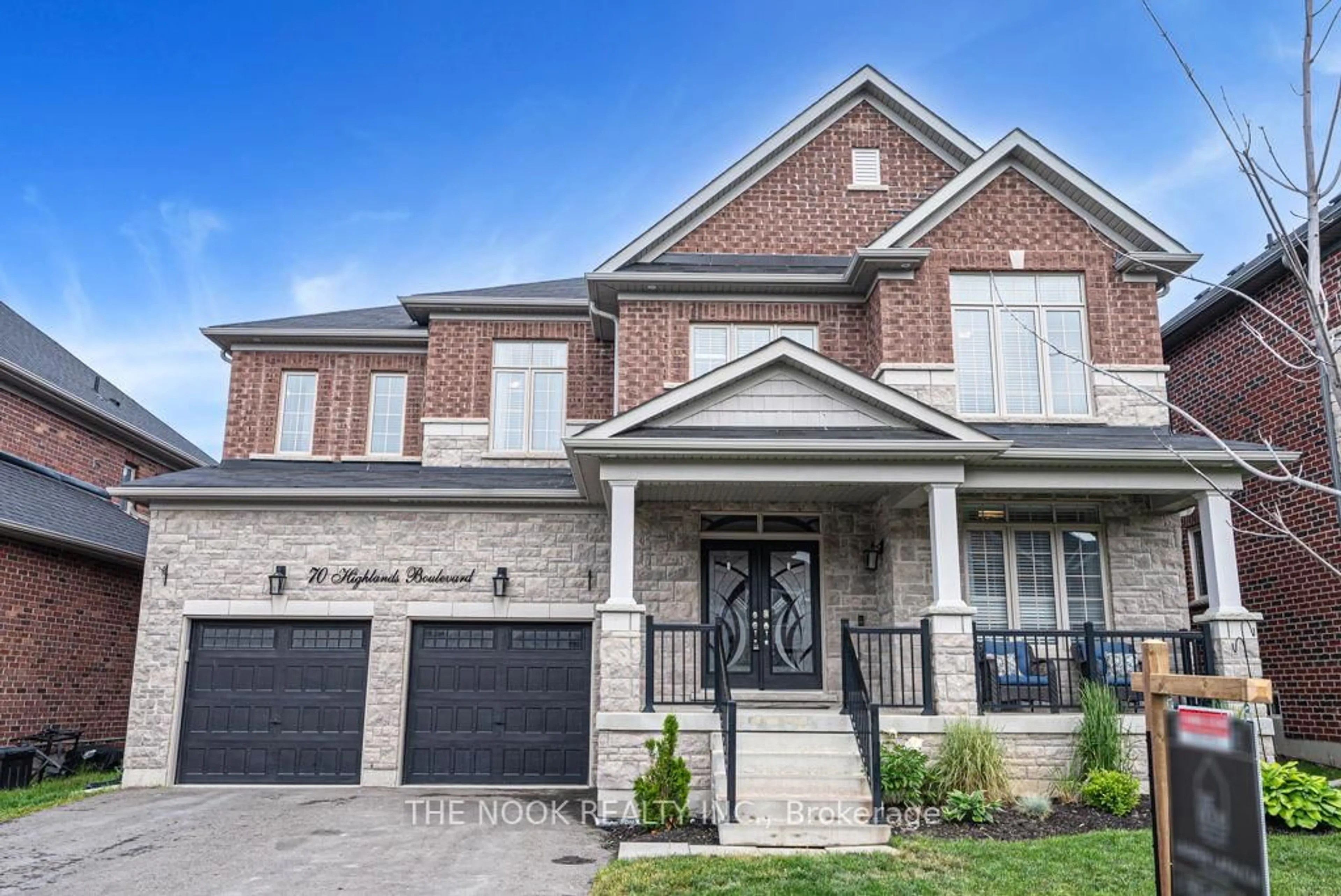 Home with brick exterior material, street for 70 Highlands Blvd, Cavan Monaghan Ontario L0A 1G0