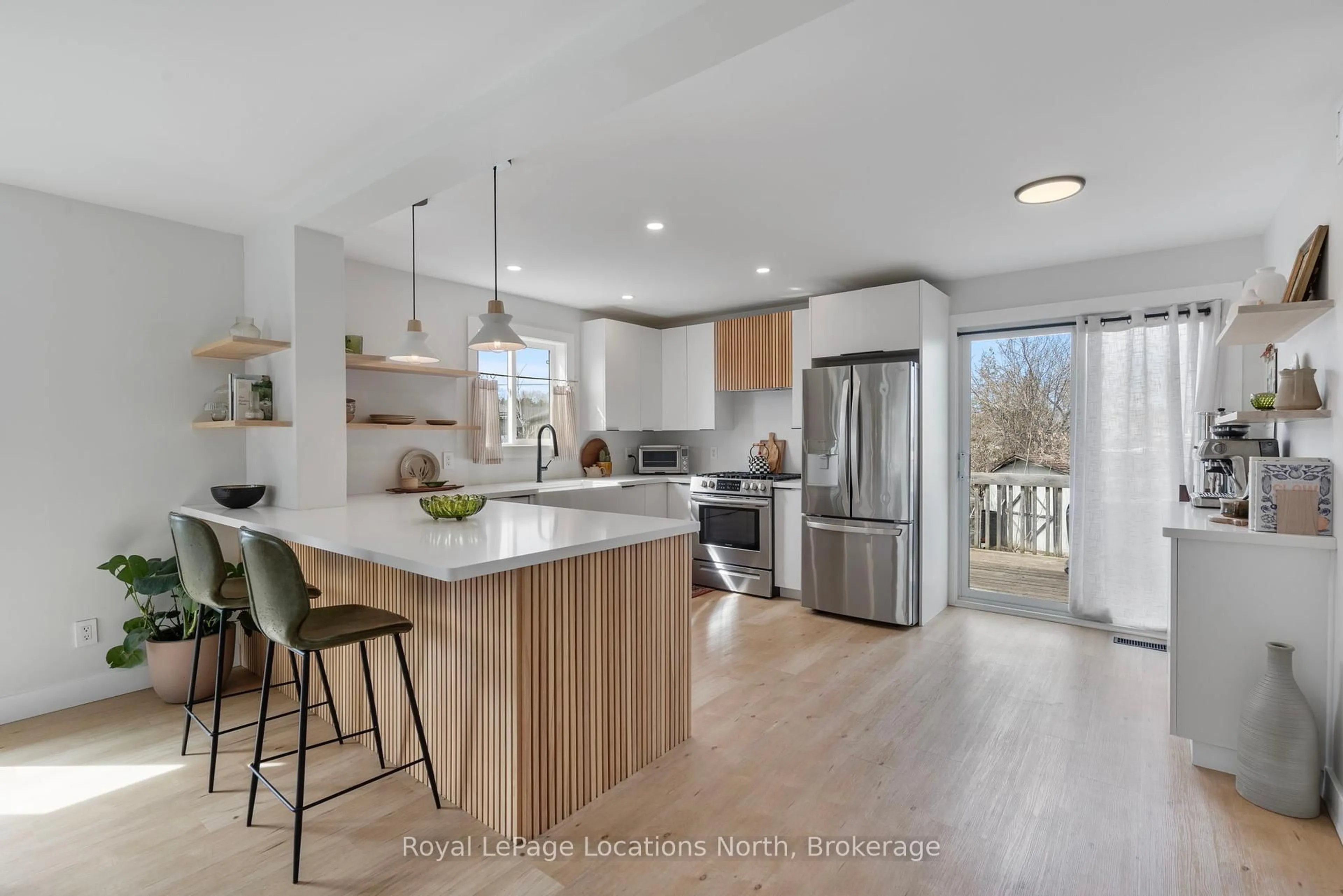 Open concept kitchen, wood/laminate floor for 50 Birchwood Crt, Meaford Ontario N4L 1T9