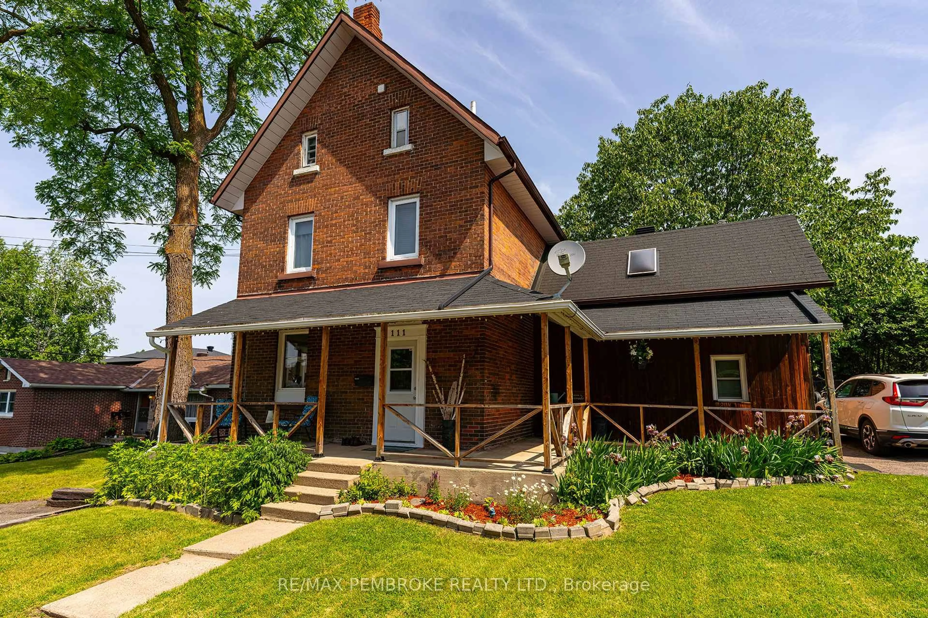Home with brick exterior material, street for 111 Hunter St, Pembroke Ontario K8A 2N6
