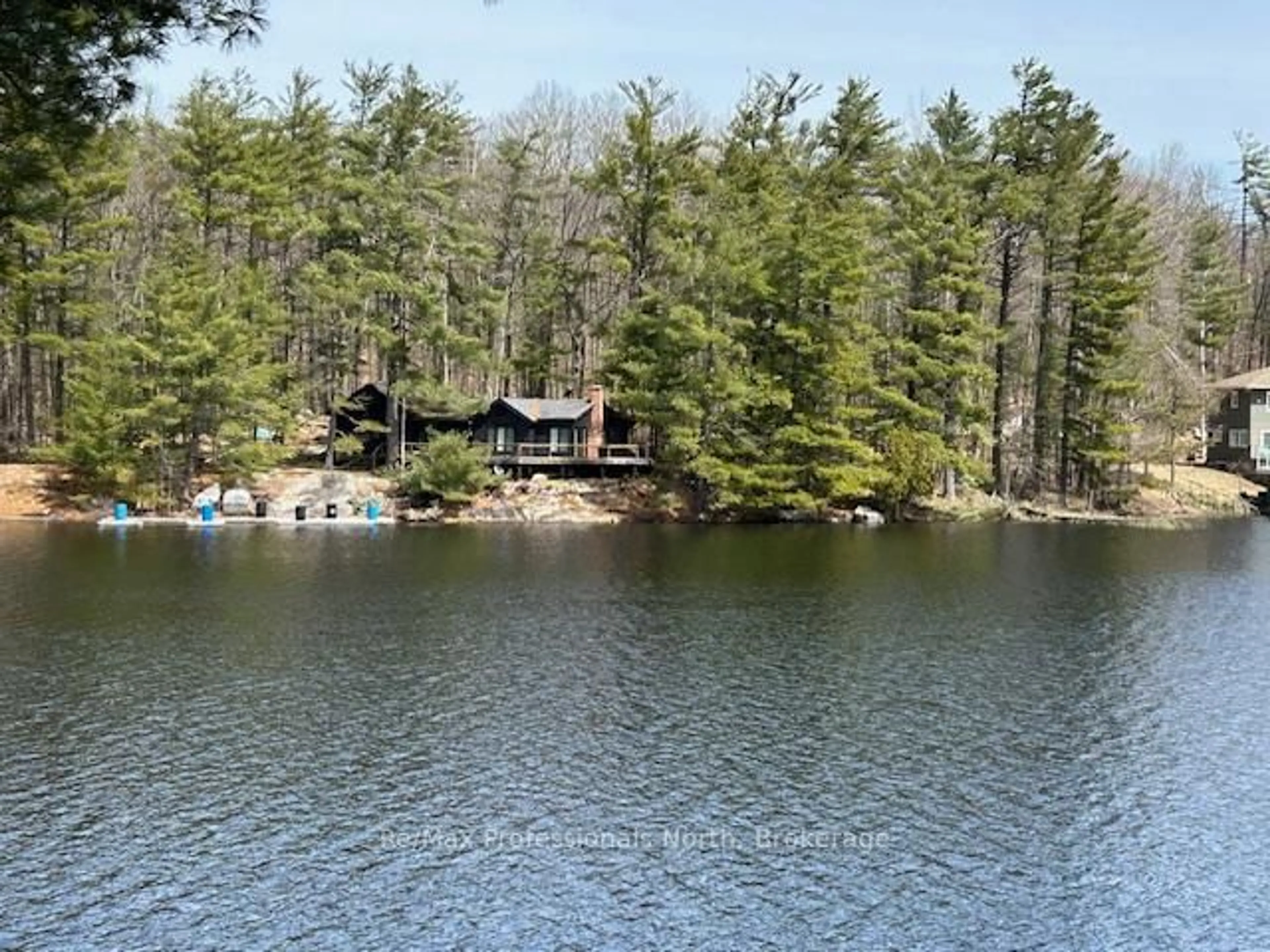 A pic from outside/outdoor area/front of a property/back of a property/a pic from drone, water/lake/river/ocean view for 61 Island 26LM Island, Gravenhurst Ontario P1P 1R2
