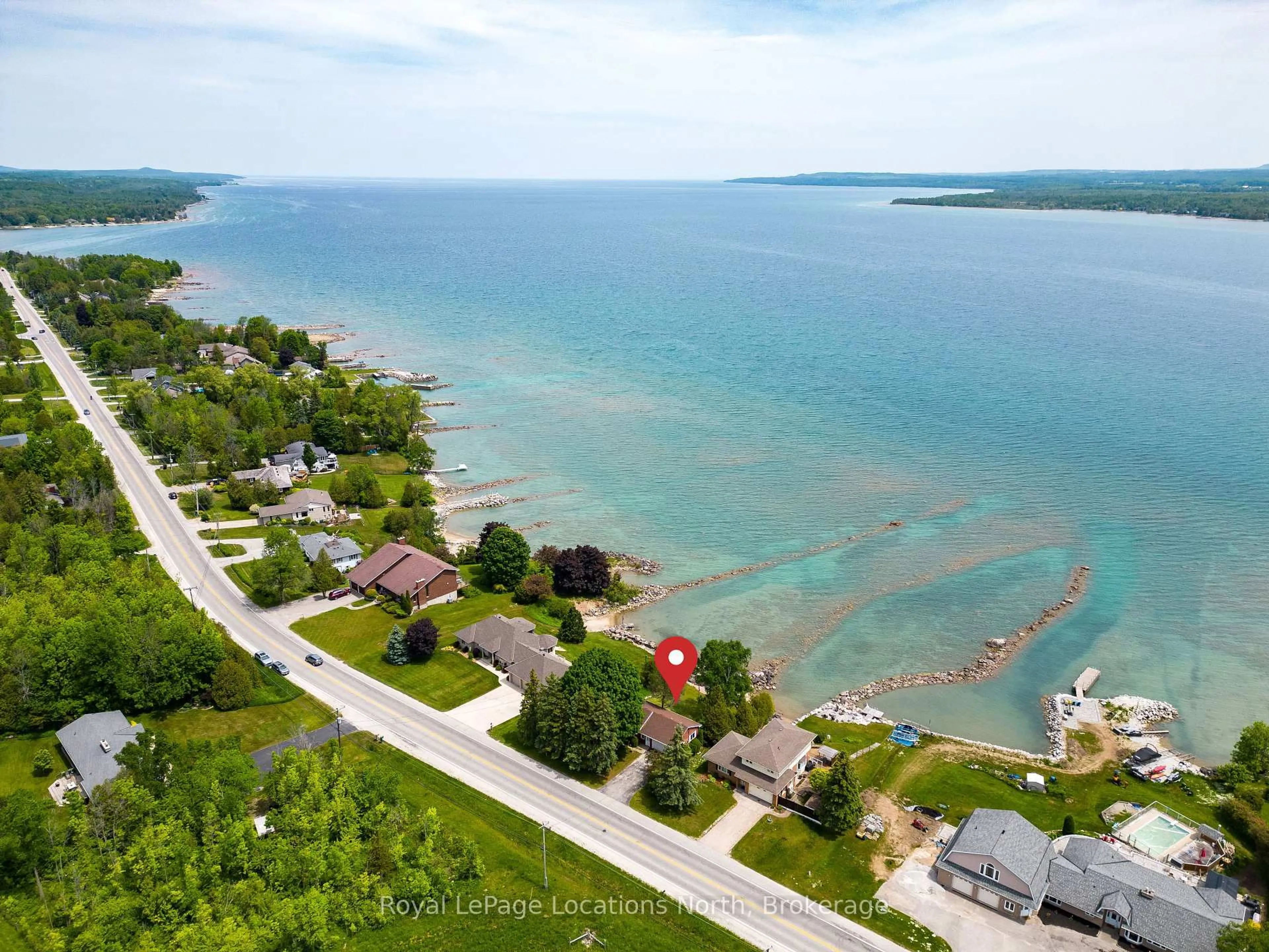 A pic from outside/outdoor area/front of a property/back of a property/a pic from drone, water/lake/river/ocean view for 318397 Grey 1 Rd, Georgian Bluffs Ontario N4K 5N4