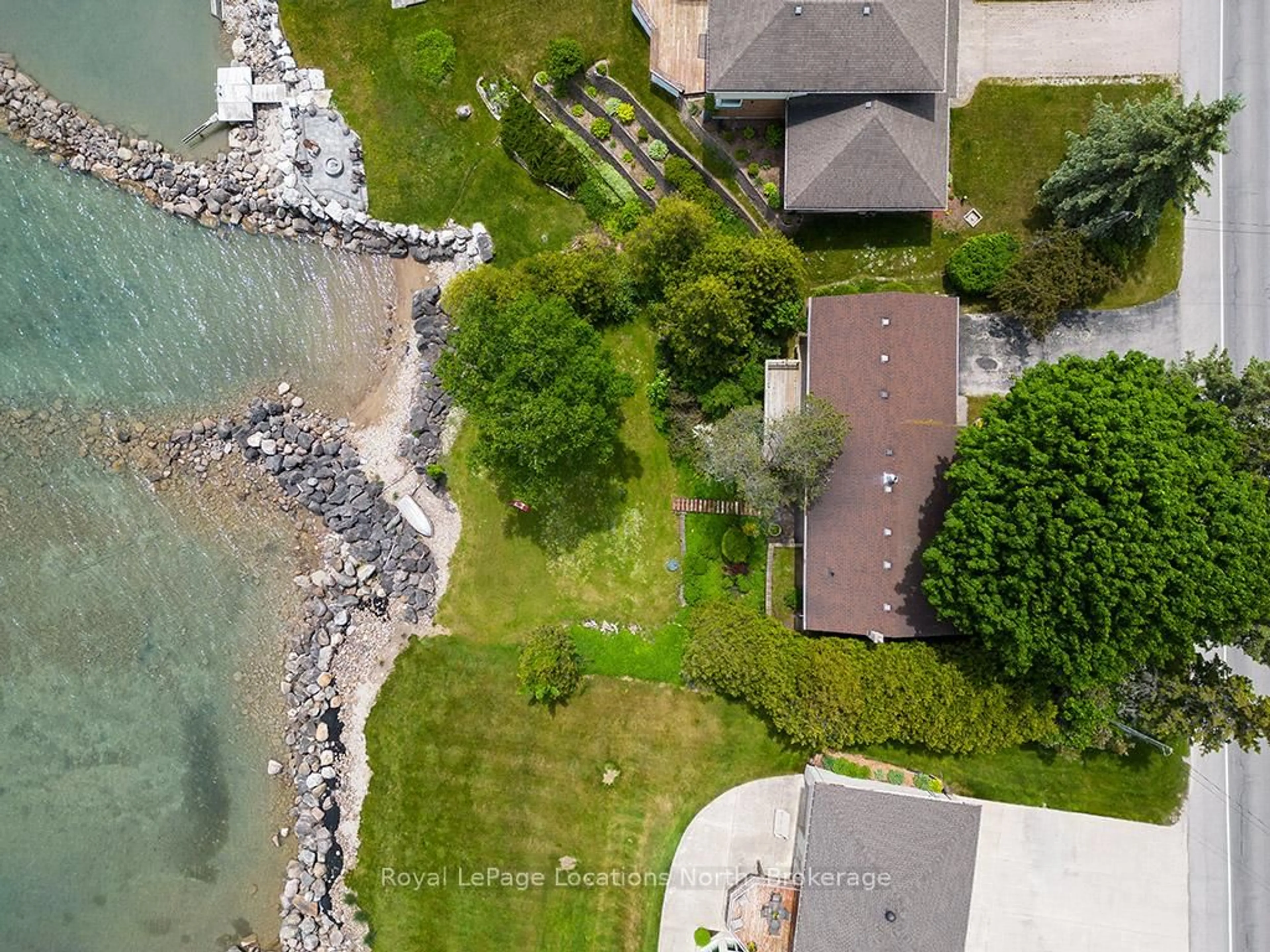 A pic from outside/outdoor area/front of a property/back of a property/a pic from drone, water/lake/river/ocean view for 318397 Grey 1 Rd, Georgian Bluffs Ontario N4K 5N4