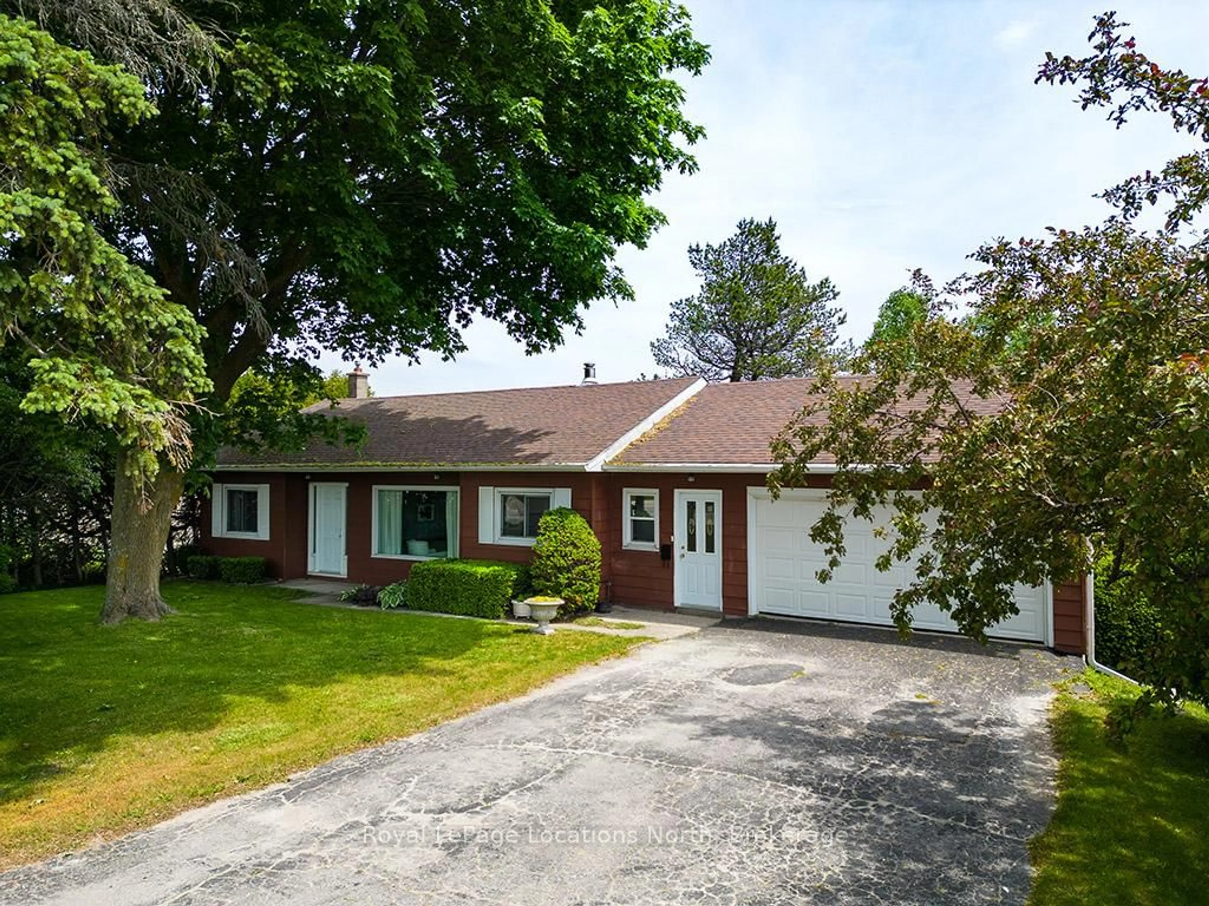 A pic from outside/outdoor area/front of a property/back of a property/a pic from drone, street for 318397 Grey 1 Rd, Georgian Bluffs Ontario N4K 5N4