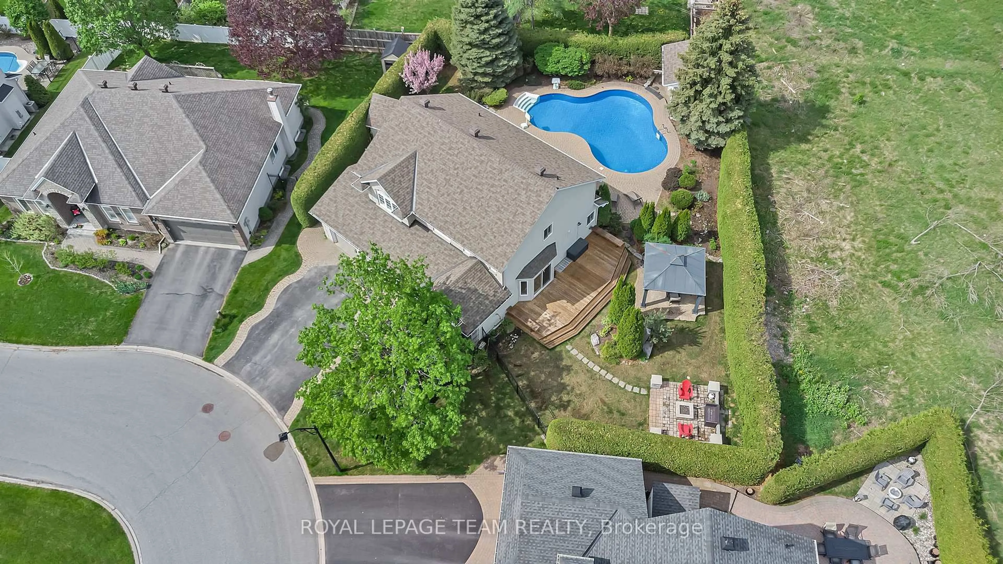 A pic from outside/outdoor area/front of a property/back of a property/a pic from drone, unknown for 27 Heritage Grove Cres, Ottawa Ontario K2S 1R2