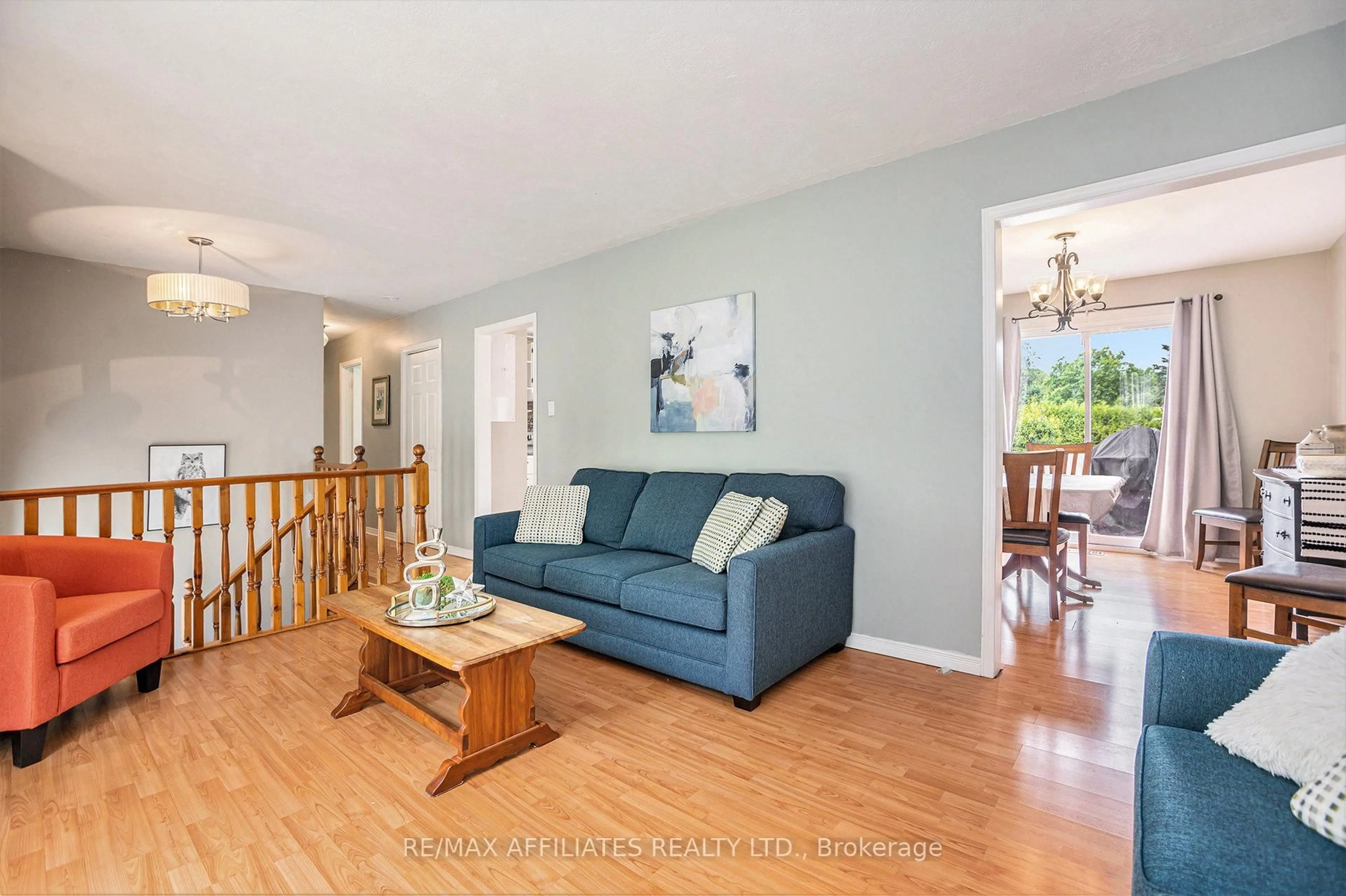 Living room with furniture, wood/laminate floor for 114 Duncan St, Smiths Falls Ontario K7A 4S4