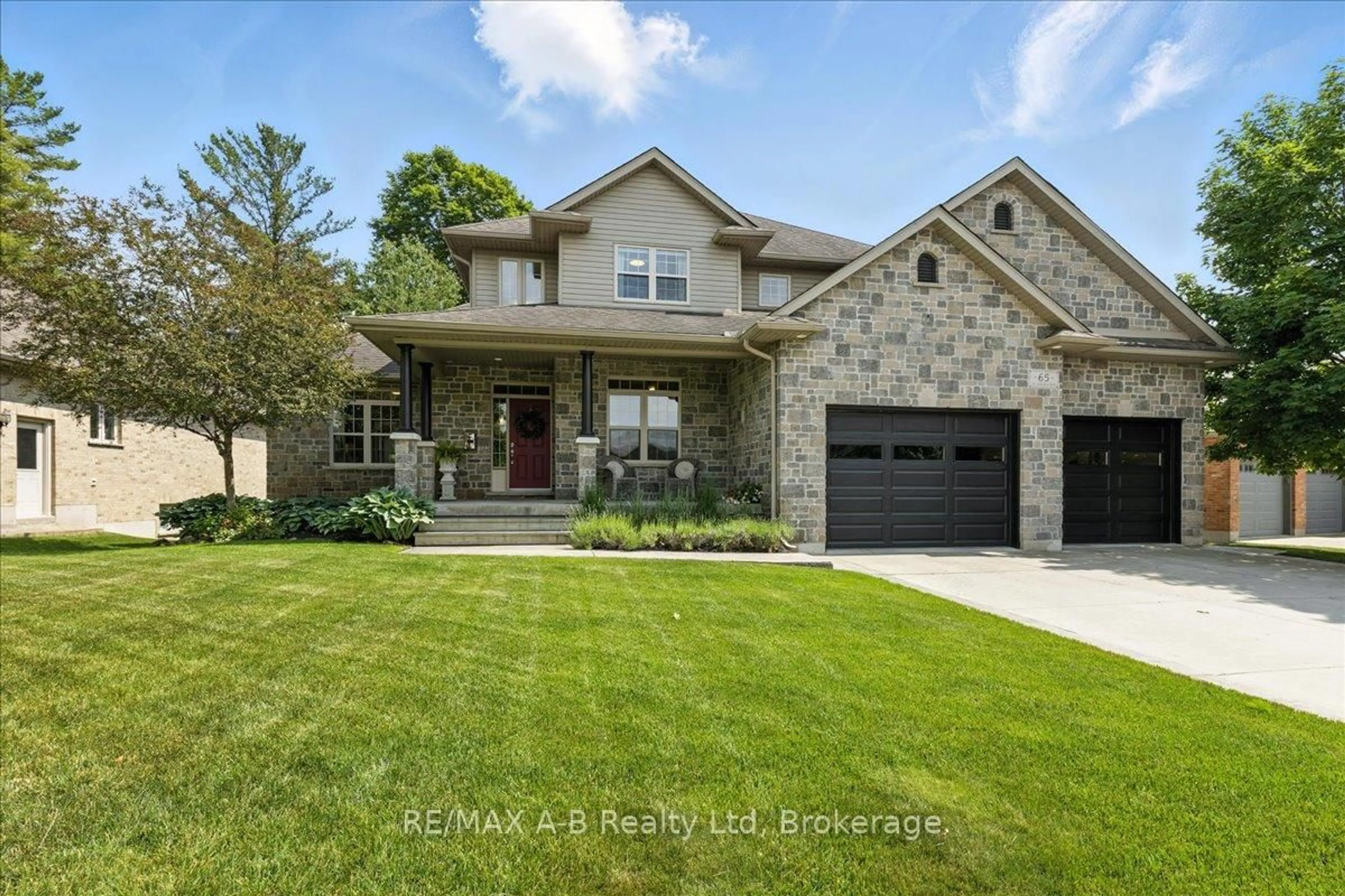Home with brick exterior material, street for 65 Sir Adam Beck Rd, Stratford Ontario N5A 8B9