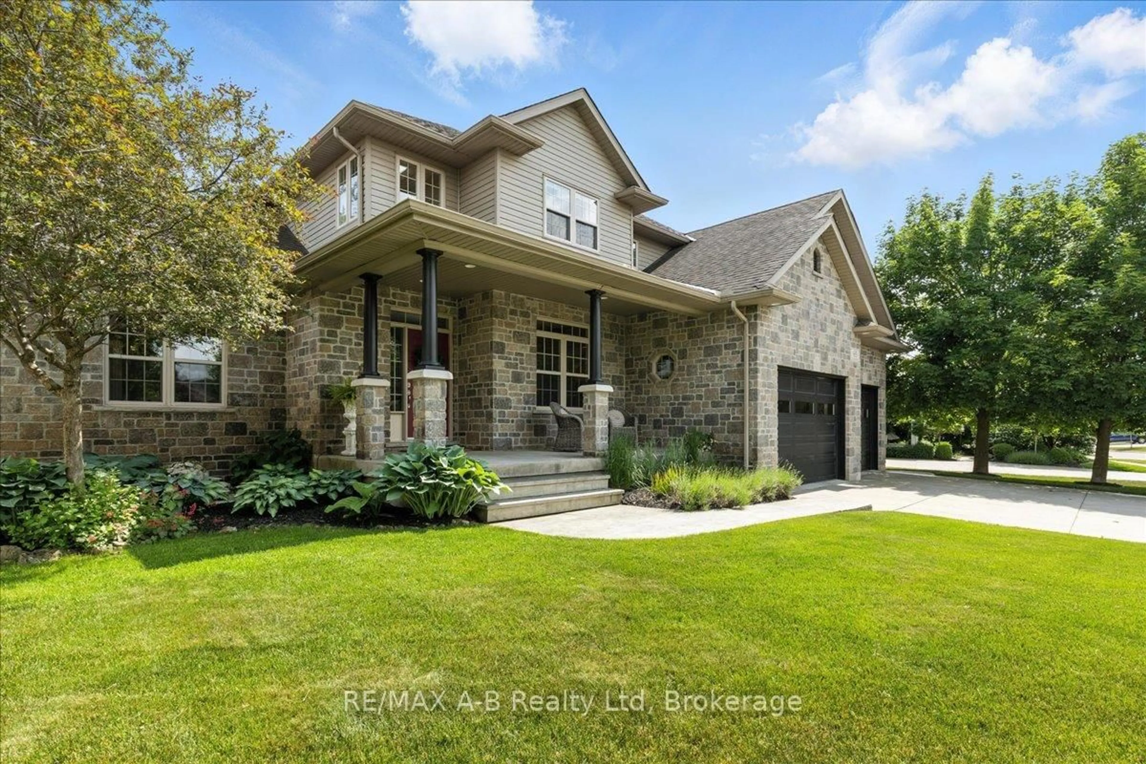 Home with brick exterior material, street for 65 Sir Adam Beck Rd, Stratford Ontario N5A 8B9