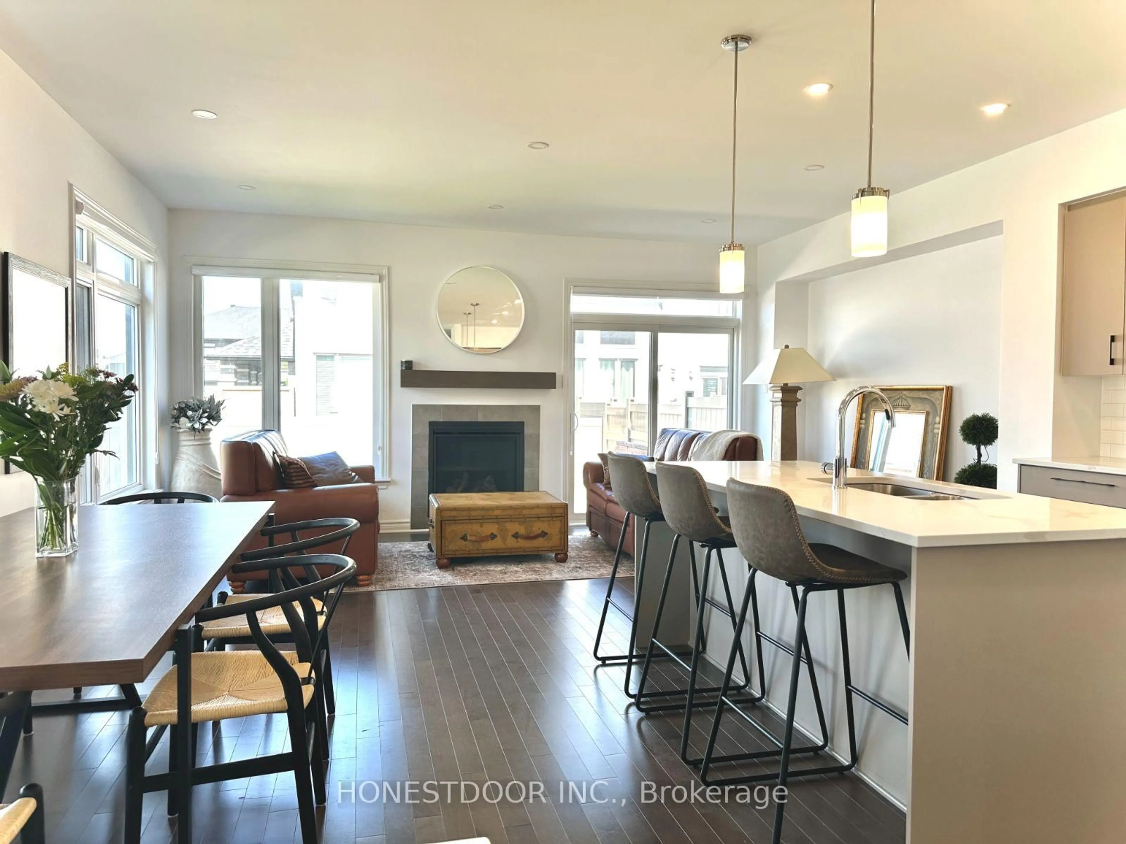 Open concept kitchen, wood/laminate floor for 665 Cordelette Circ, Ottawa Ontario K1W 0P2