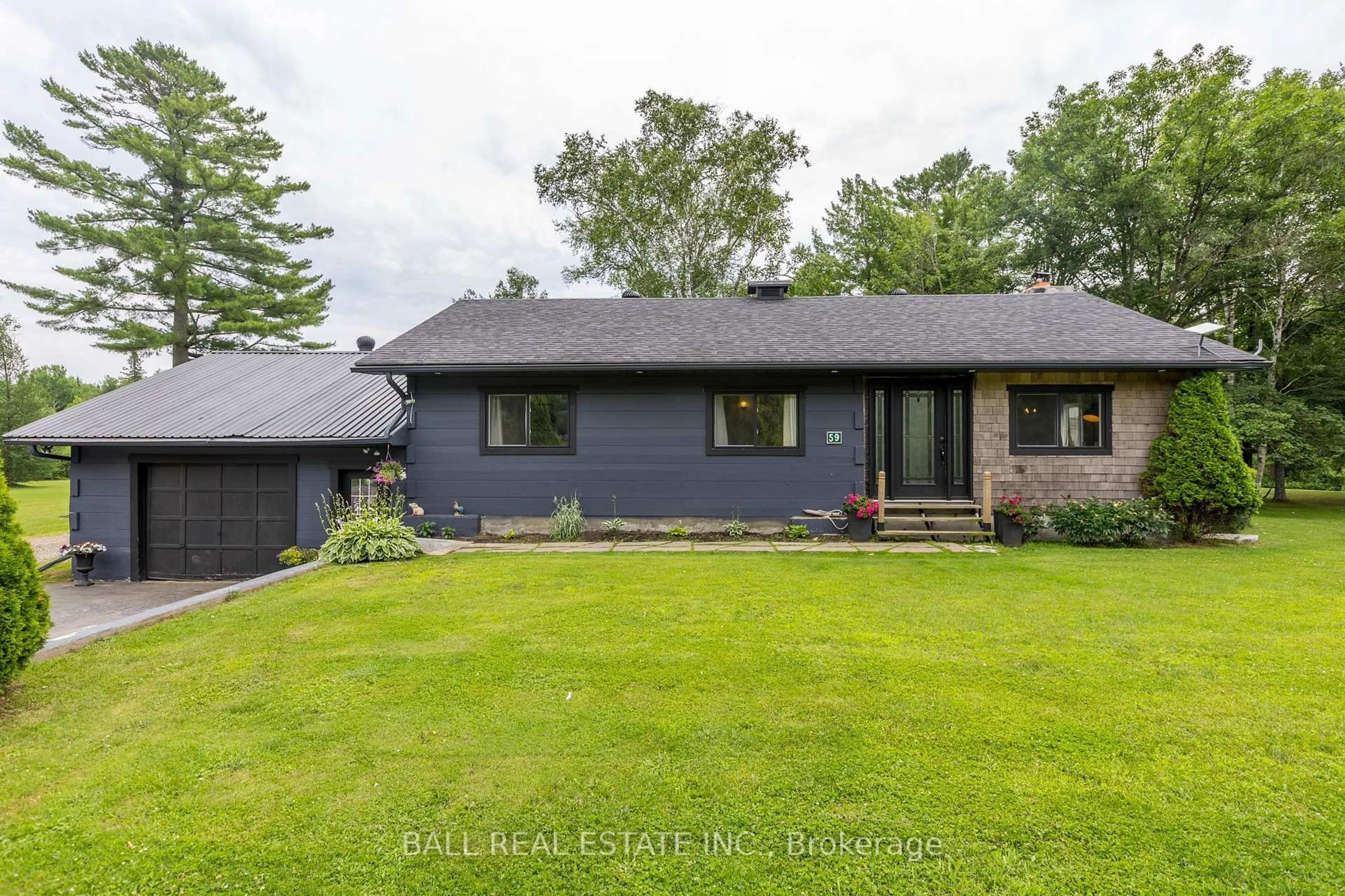 A pic from outside/outdoor area/front of a property/back of a property/a pic from drone, street for 59 Trotters Rd, North Kawartha Ontario K0L 1A0
