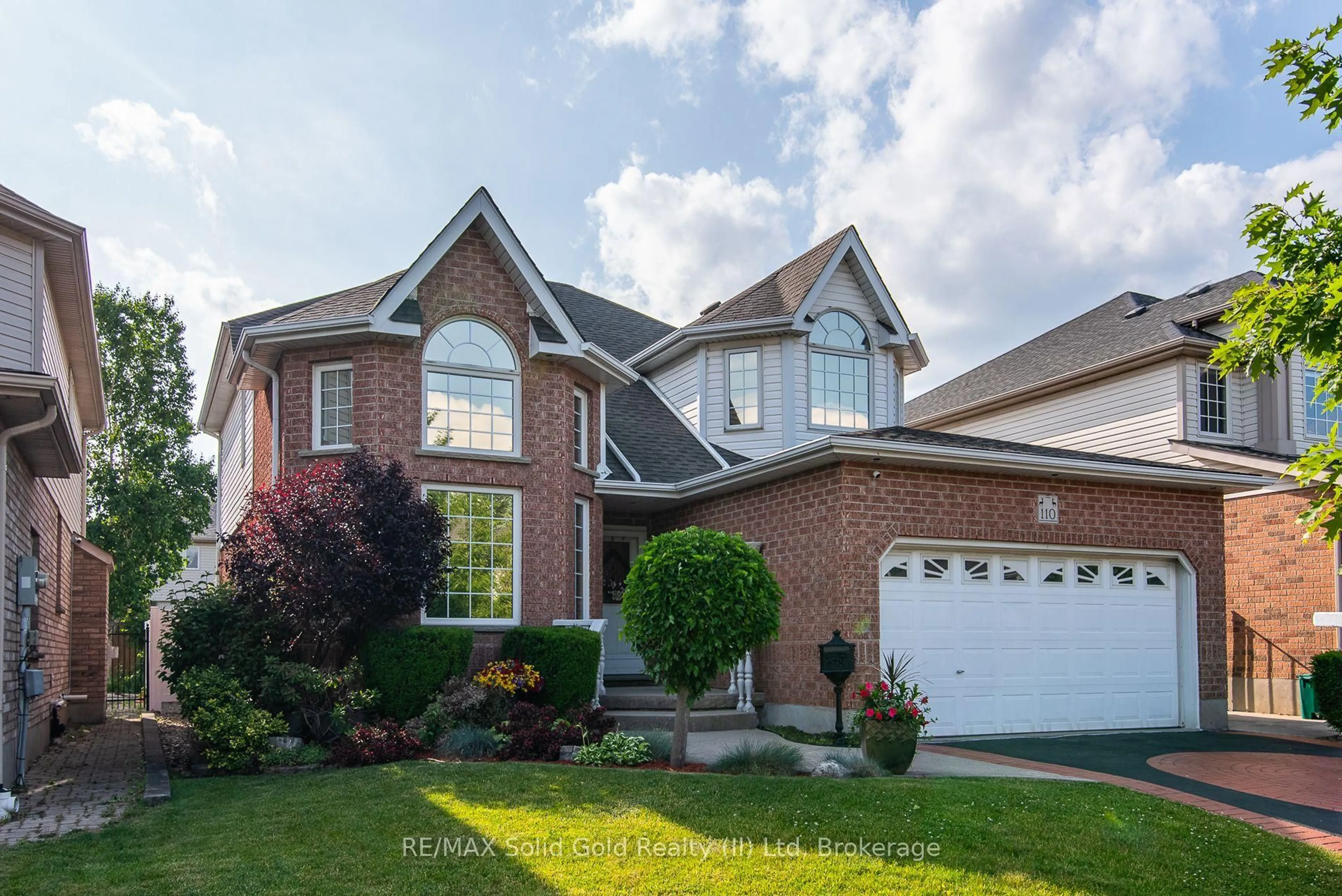 Home with brick exterior material, street for 110 Deer Ridge Dr, Kitchener Ontario N2P 2K9