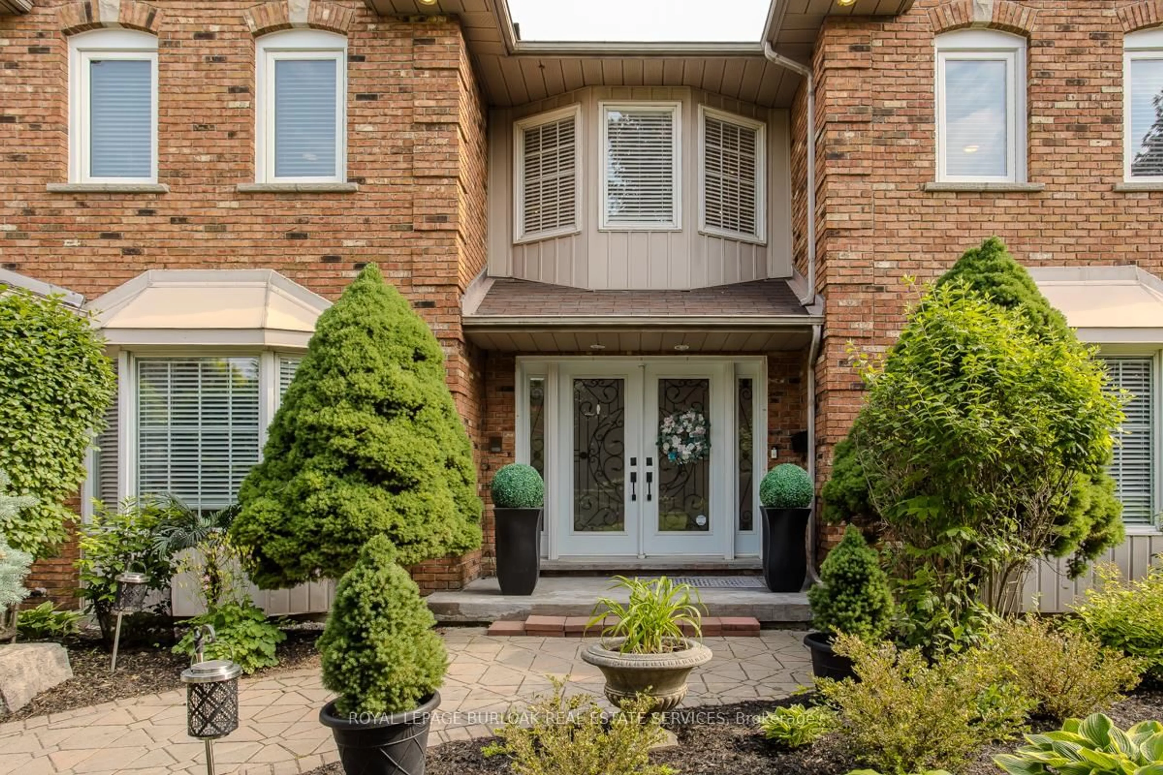 Home with brick exterior material, street for 168 Bluebell Cres, Hamilton Ontario L9K 1E7