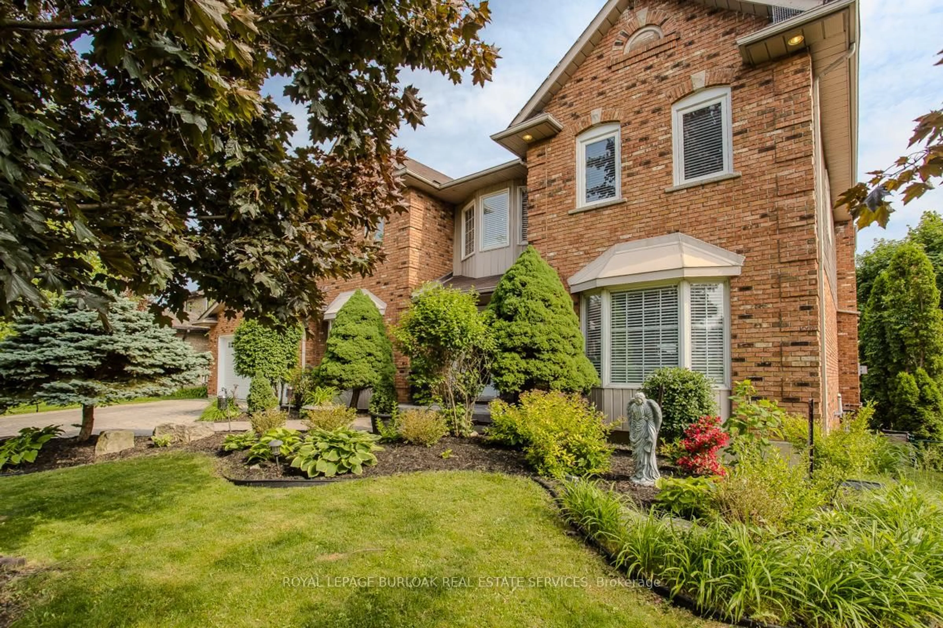 Home with brick exterior material, street for 168 Bluebell Cres, Hamilton Ontario L9K 1E7
