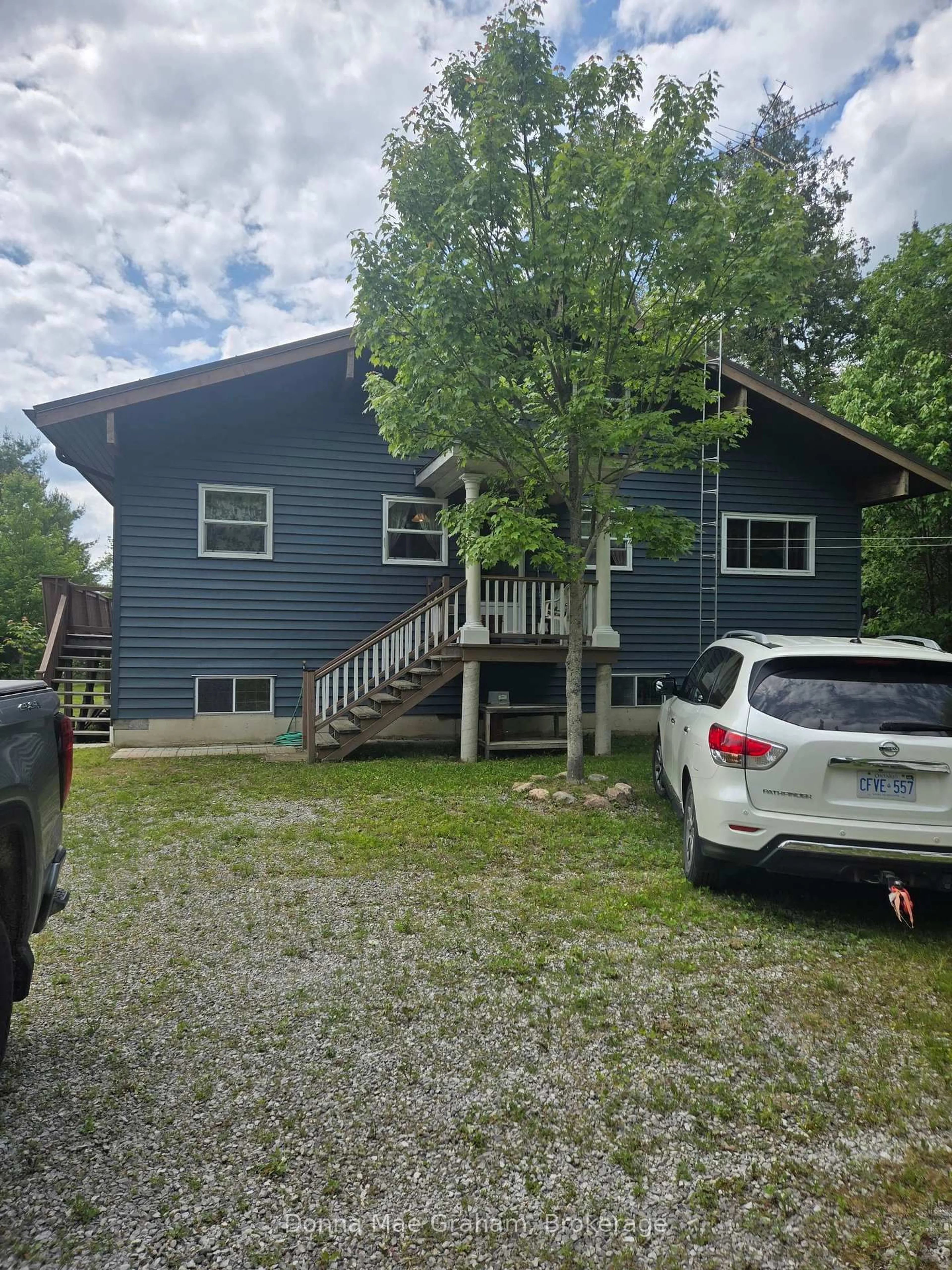 A pic from outside/outdoor area/front of a property/back of a property/a pic from drone, street for 1020 Granite Lane, Highlands East Ontario K0M 1R0
