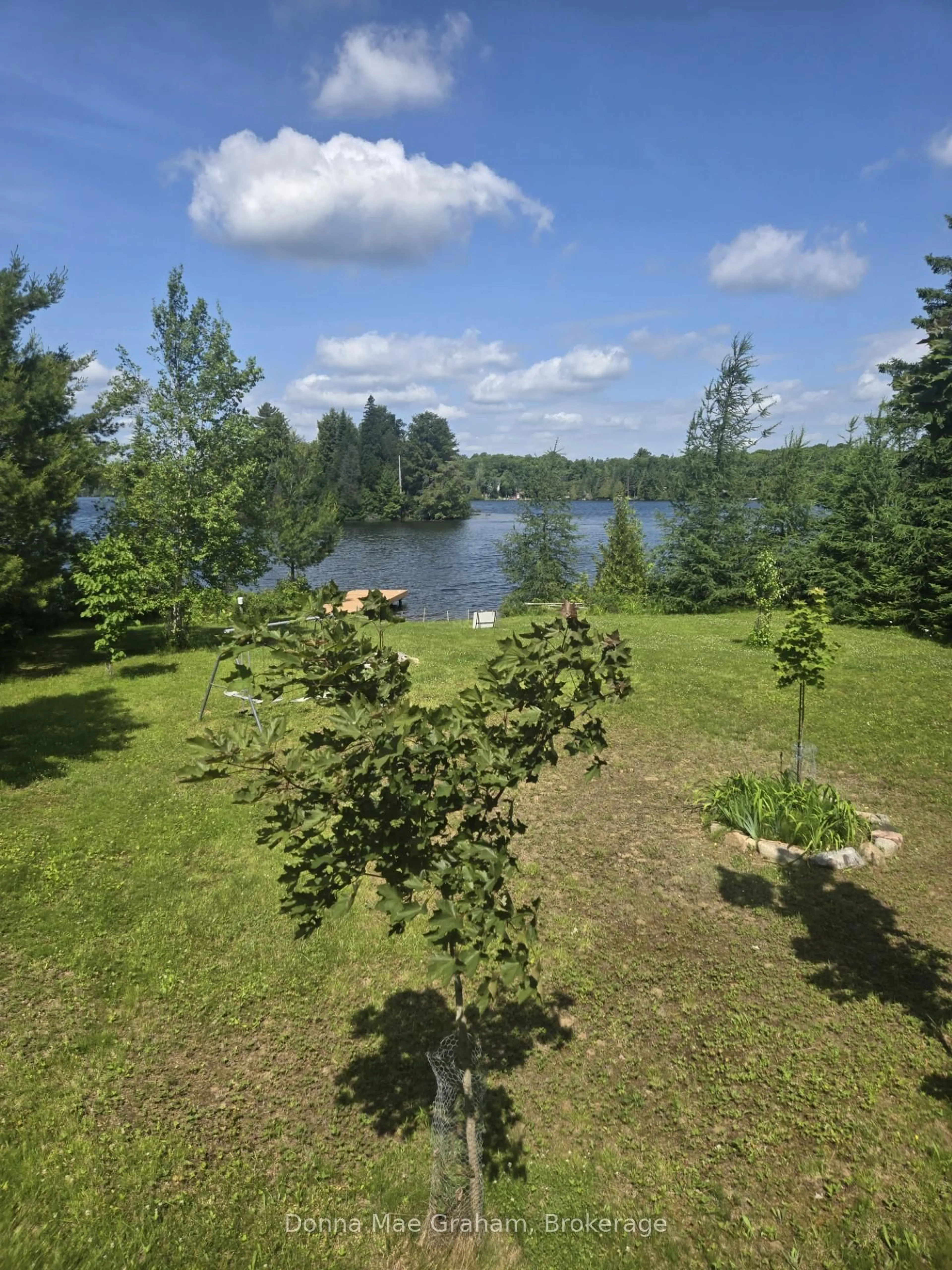A pic from outside/outdoor area/front of a property/back of a property/a pic from drone, water/lake/river/ocean view for 1020 Granite Lane, Highlands East Ontario K0M 1R0