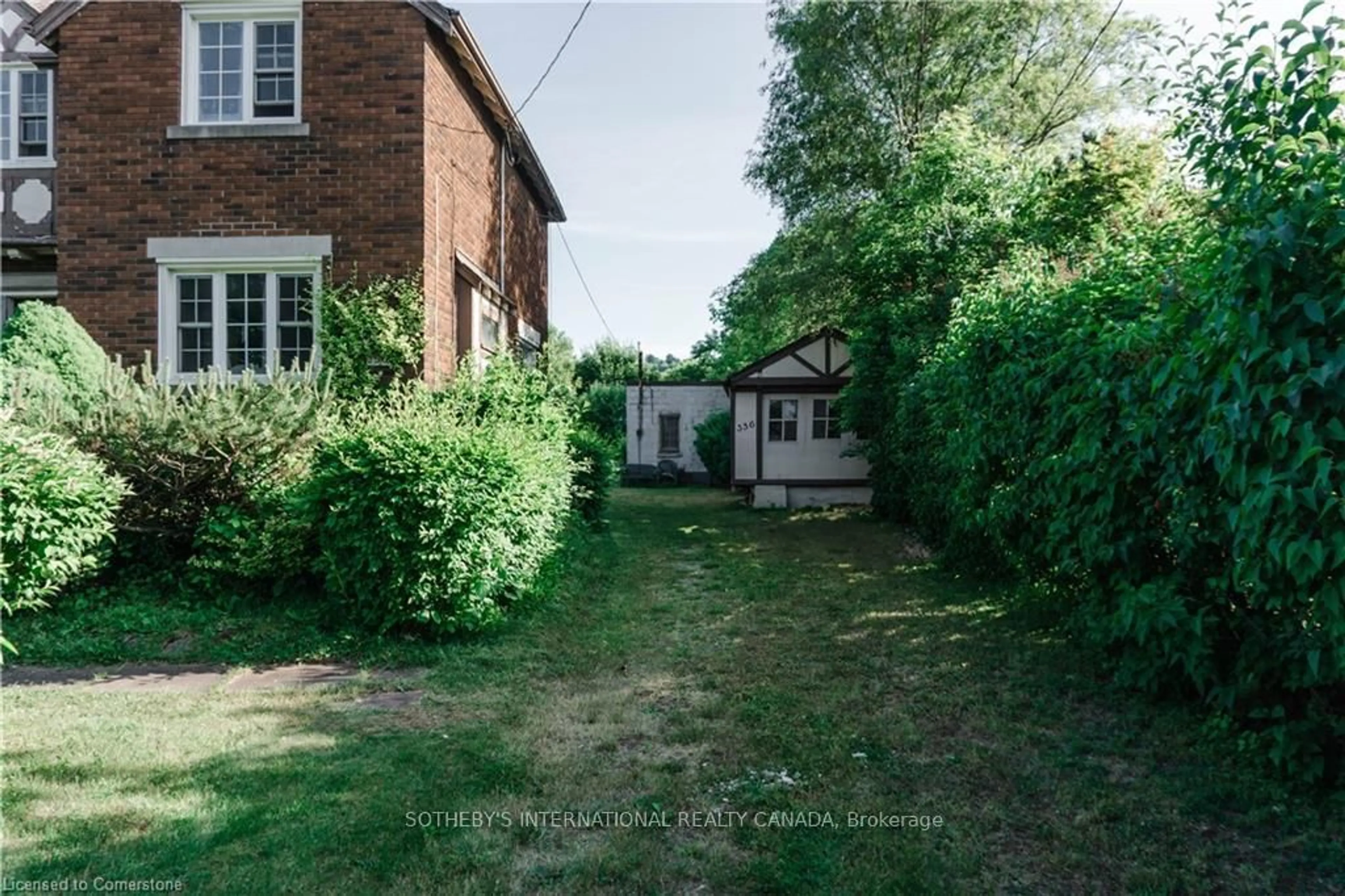 A pic from outside/outdoor area/front of a property/back of a property/a pic from drone, street for 356 King St, Hamilton Ontario L8G 1M4