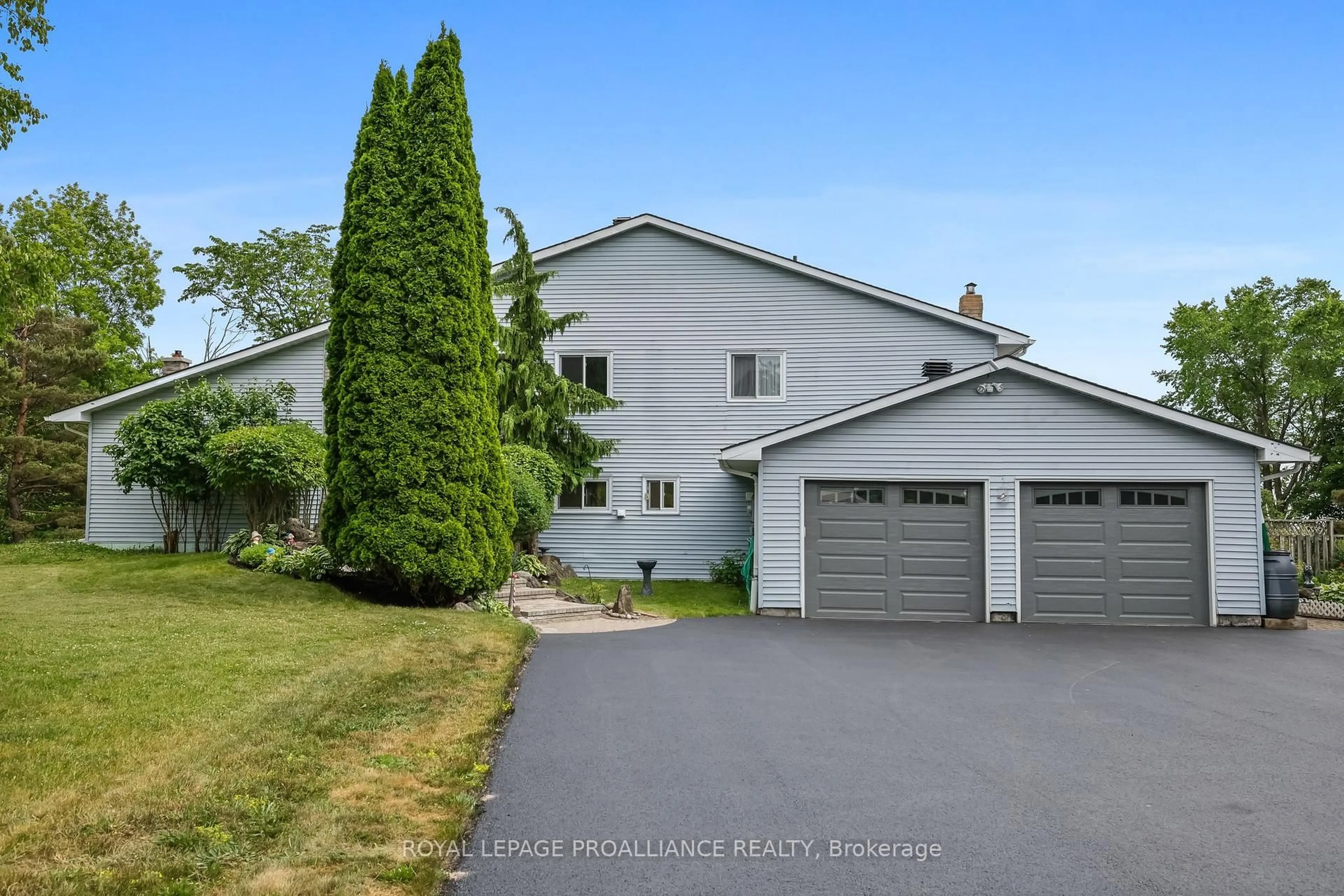 A pic from outside/outdoor area/front of a property/back of a property/a pic from drone, unknown for 748 County Rd 26, Brighton Ontario K0K 1H0