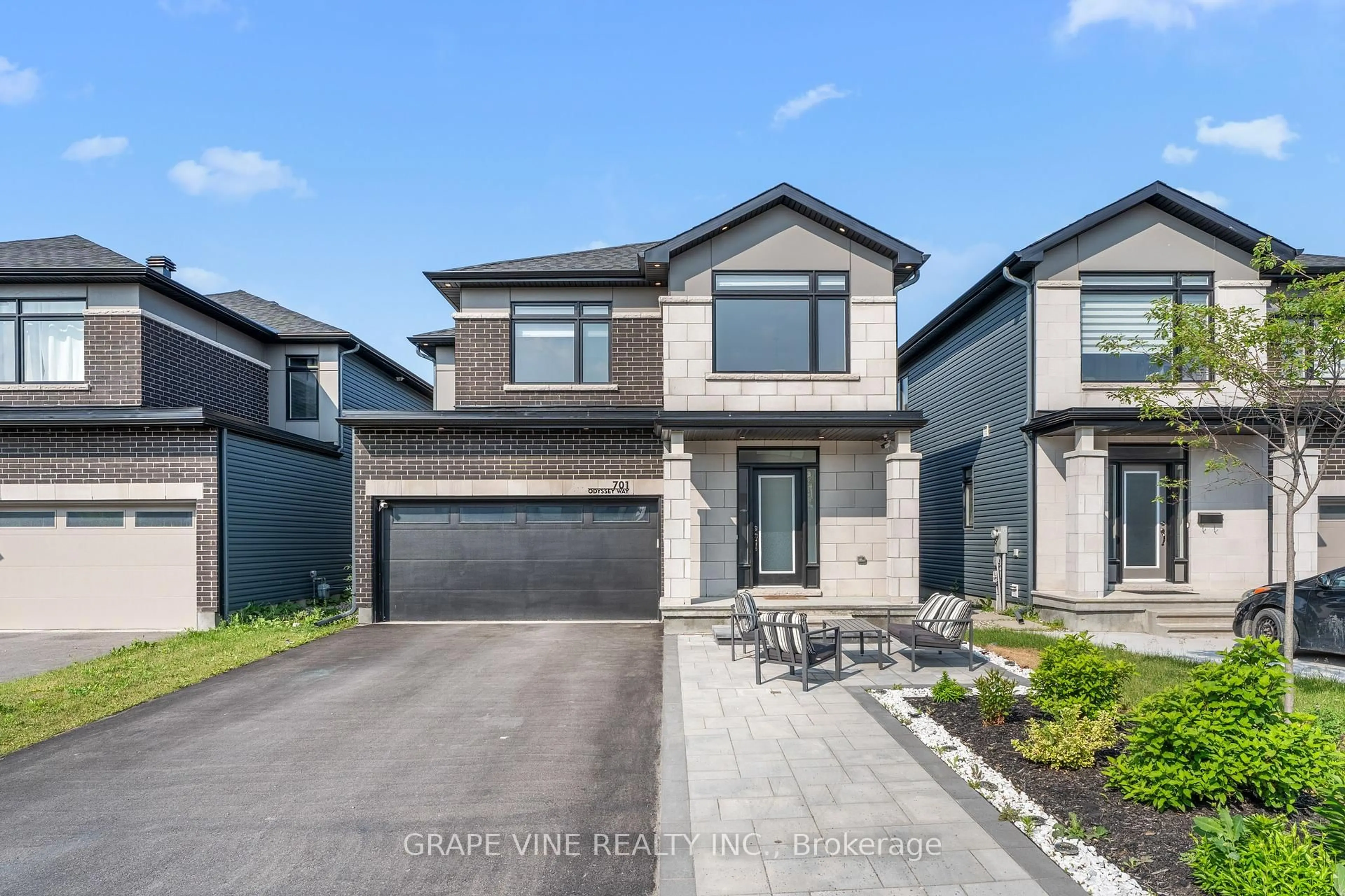 Home with brick exterior material, street for 701 Odyssey Way, Ottawa Ontario K1T 0V3