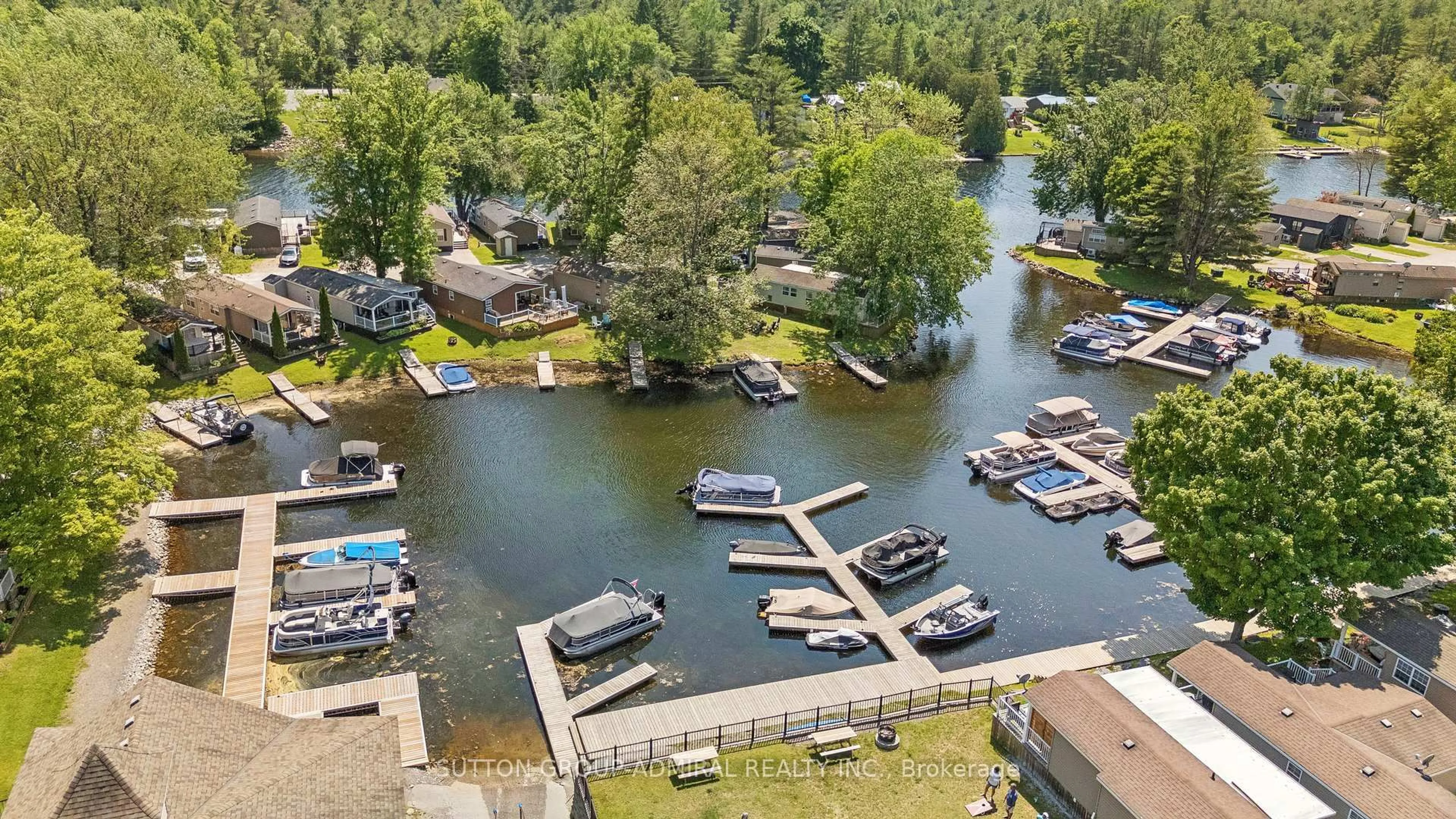 A pic from outside/outdoor area/front of a property/back of a property/a pic from drone, water/lake/river/ocean view for 1082 SHAMROCK MARINA Rd #70, Gravenhurst Ontario P0E 1G0