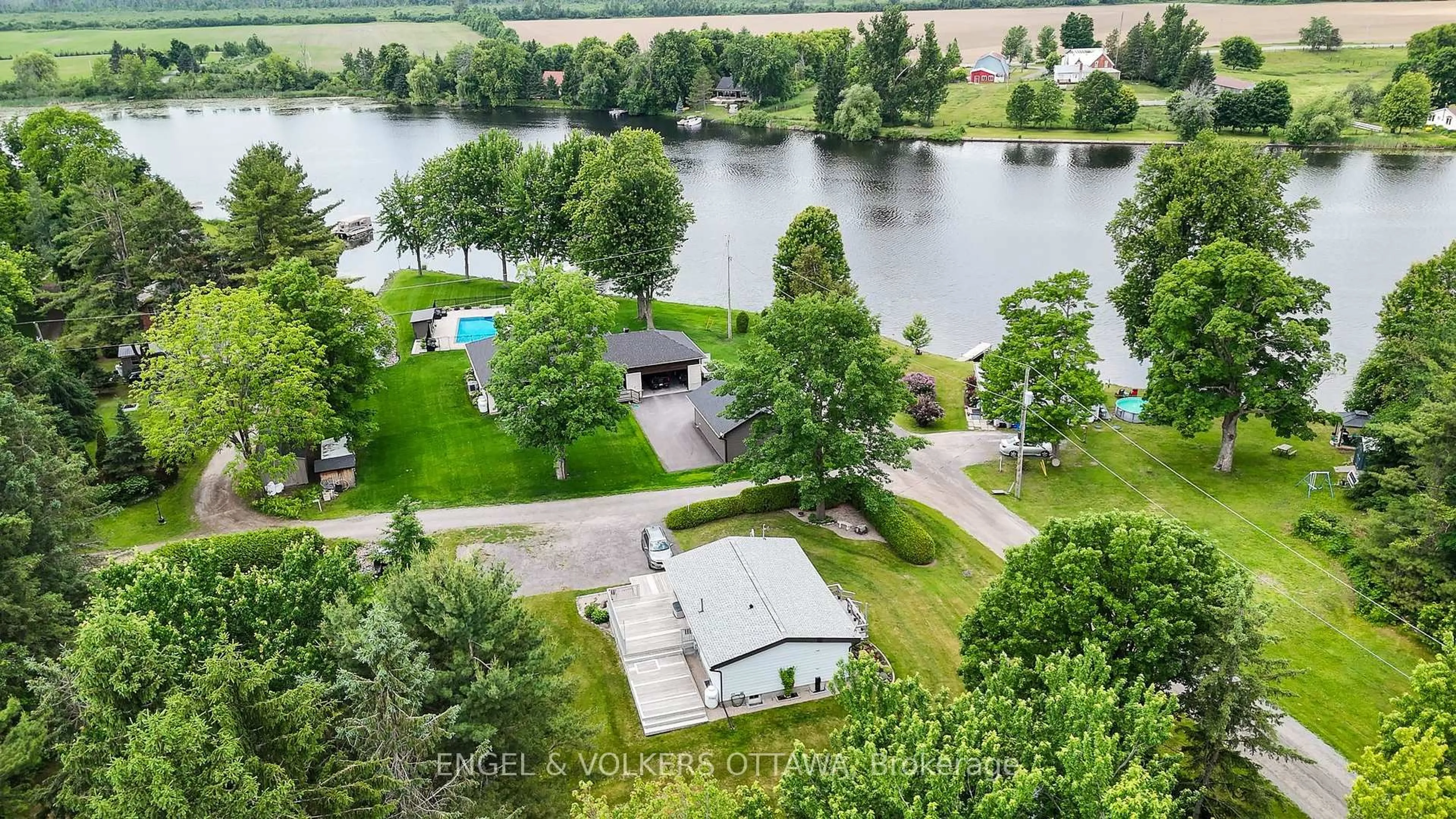 A pic from outside/outdoor area/front of a property/back of a property/a pic from drone, water/lake/river/ocean view for 3250E River Rd, Ottawa Ontario K4M 1B4