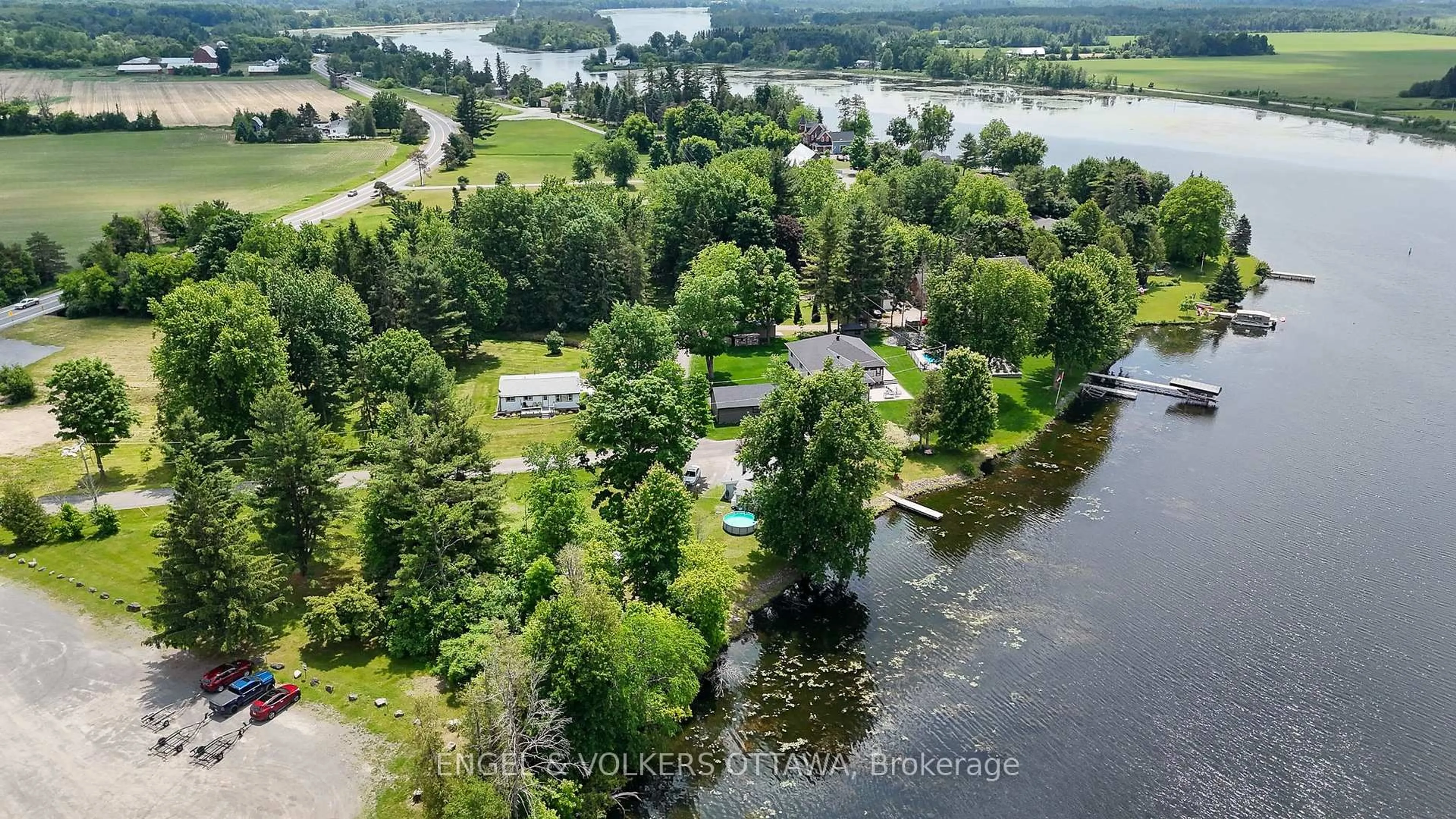 A pic from outside/outdoor area/front of a property/back of a property/a pic from drone, water/lake/river/ocean view for 3250E River Rd, Ottawa Ontario K4M 1B4