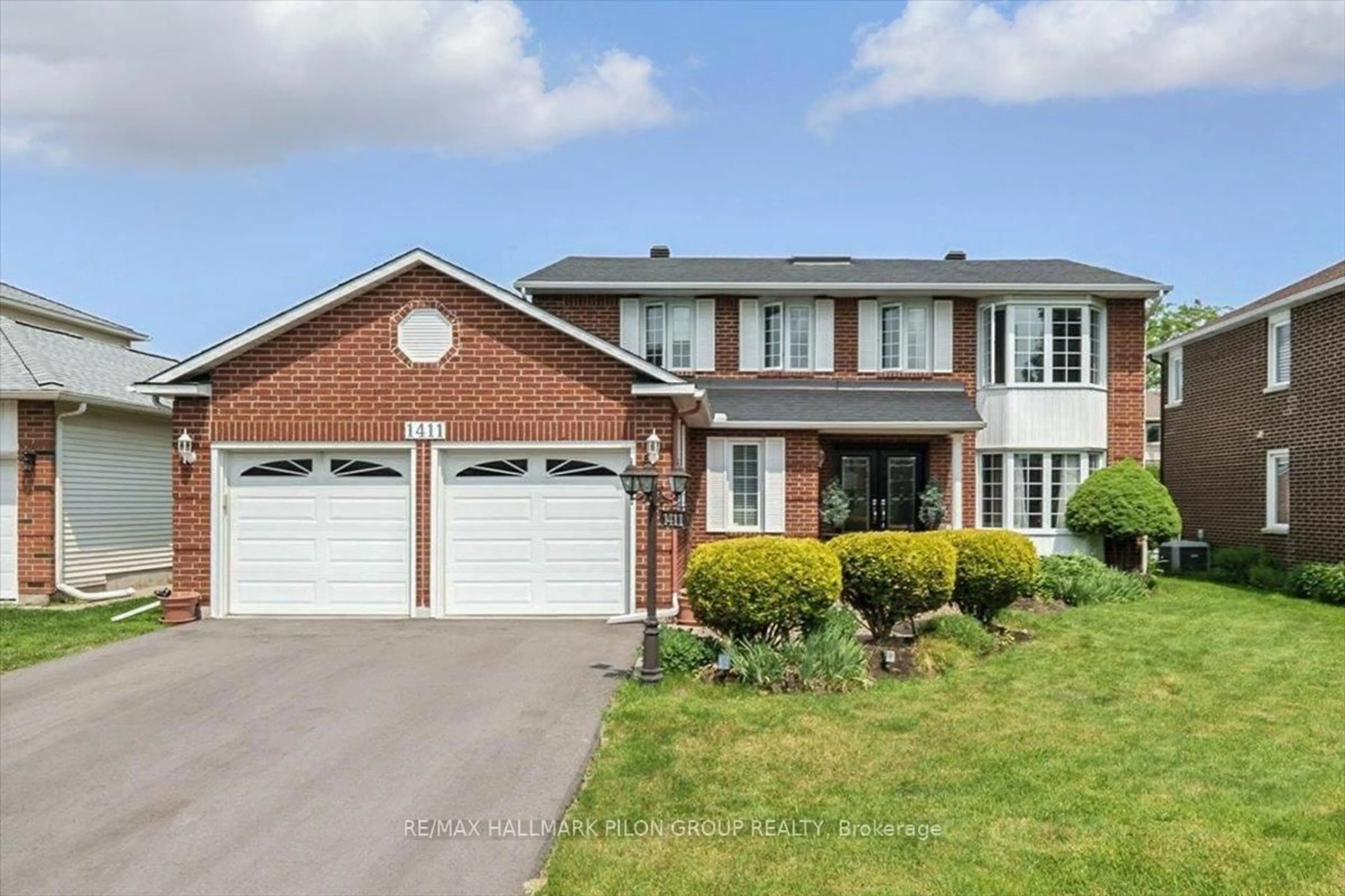 Home with brick exterior material, street for 1411 Bourcier Dr, Ottawa Ontario K1E 3K9