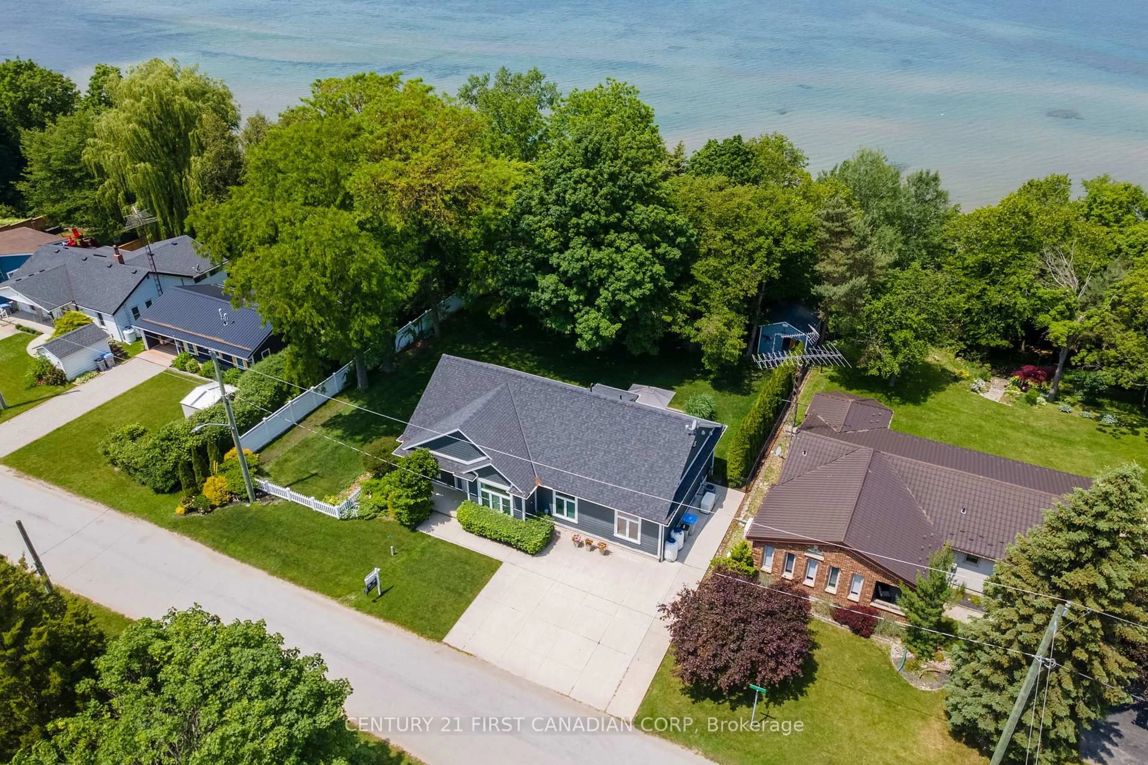A pic from outside/outdoor area/front of a property/back of a property/a pic from drone, water/lake/river/ocean view for 5144 Cedarview Dr, Lambton Shores Ontario N0N 1J0