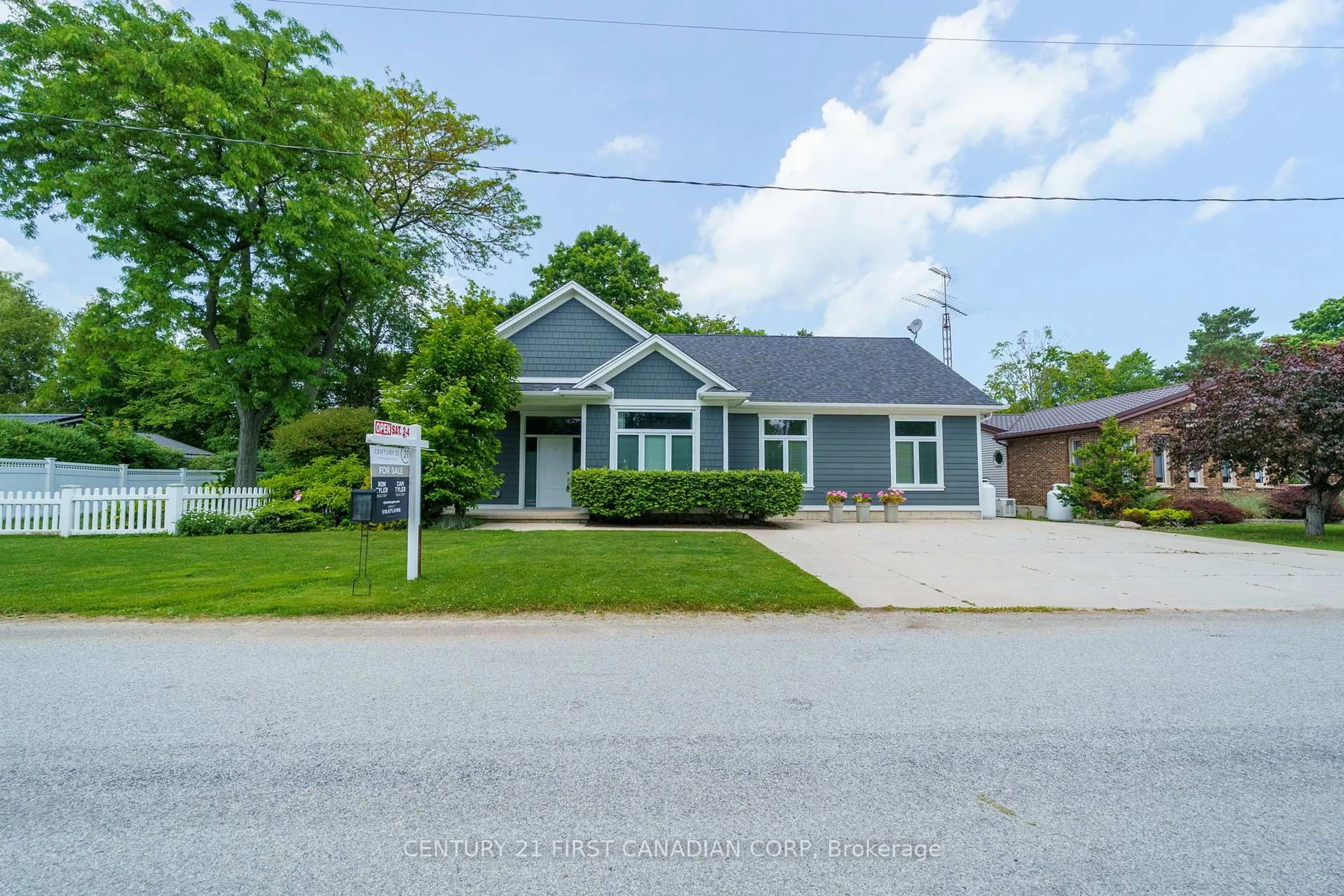 A pic from outside/outdoor area/front of a property/back of a property/a pic from drone, street for 5144 Cedarview Dr, Lambton Shores Ontario N0N 1J0