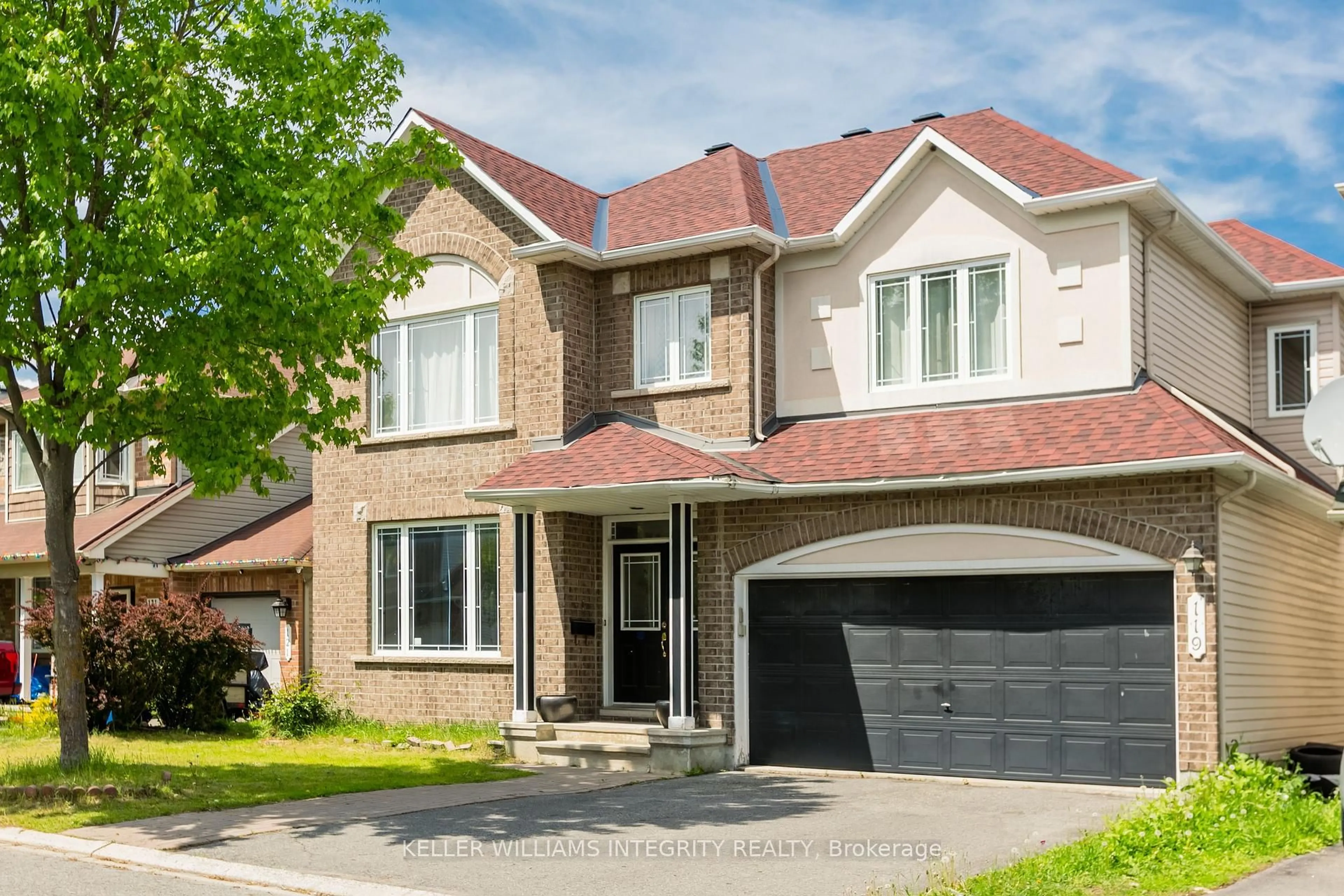 Home with brick exterior material, street for 119 Willow Creek Circ, Ottawa Ontario K2G 7A8