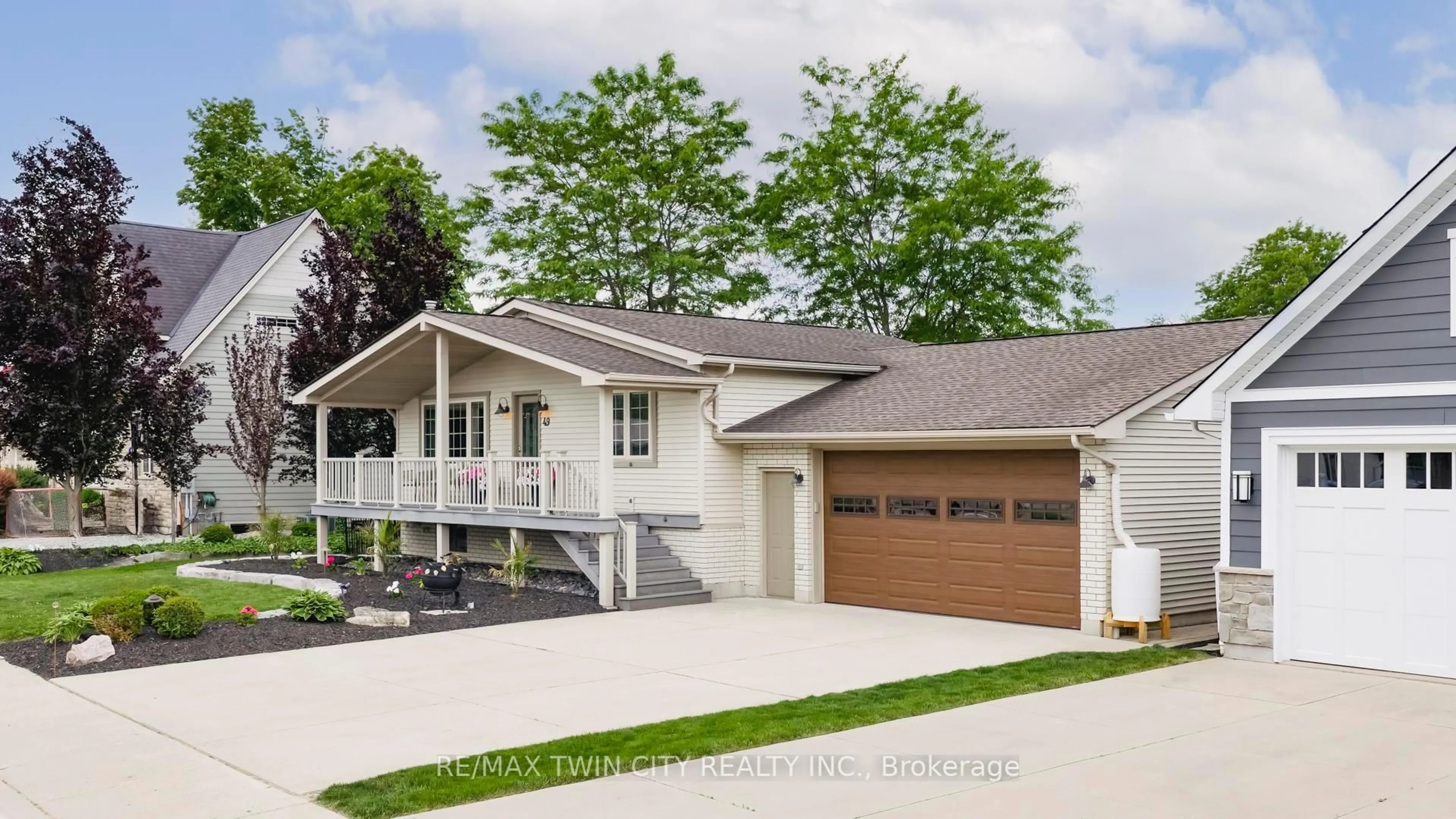 Home with vinyl exterior material, street for 49 Gill Rd, Lambton Shores Ontario N0M 1T0