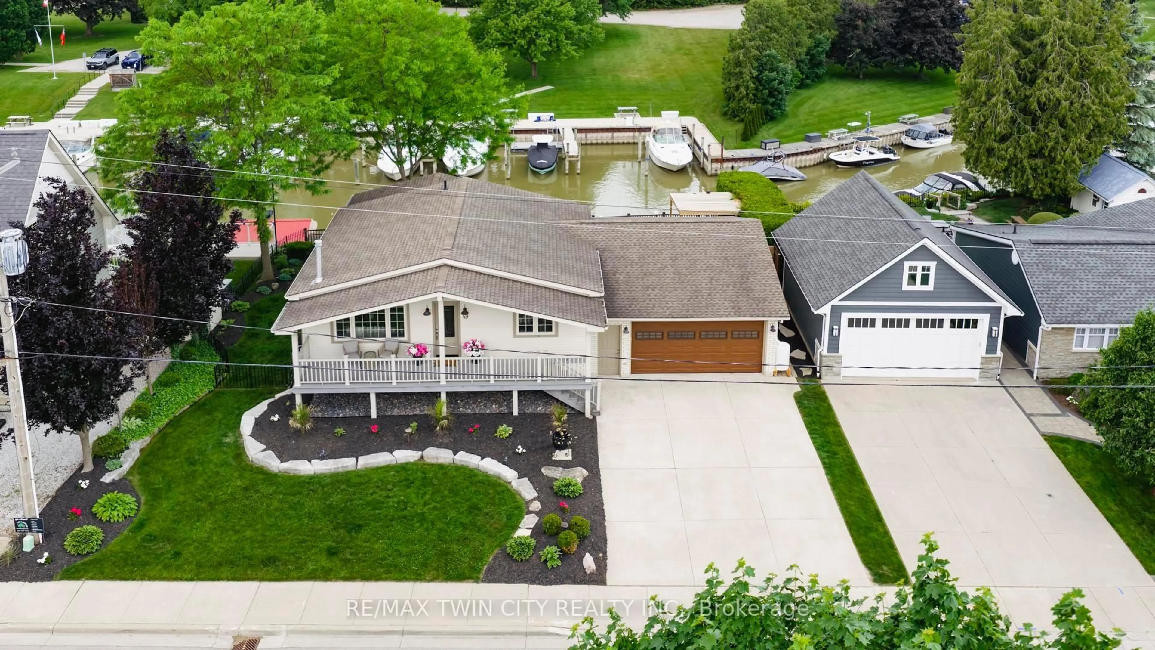 A pic from outside/outdoor area/front of a property/back of a property/a pic from drone, street for 49 Gill Rd, Lambton Shores Ontario N0M 1T0