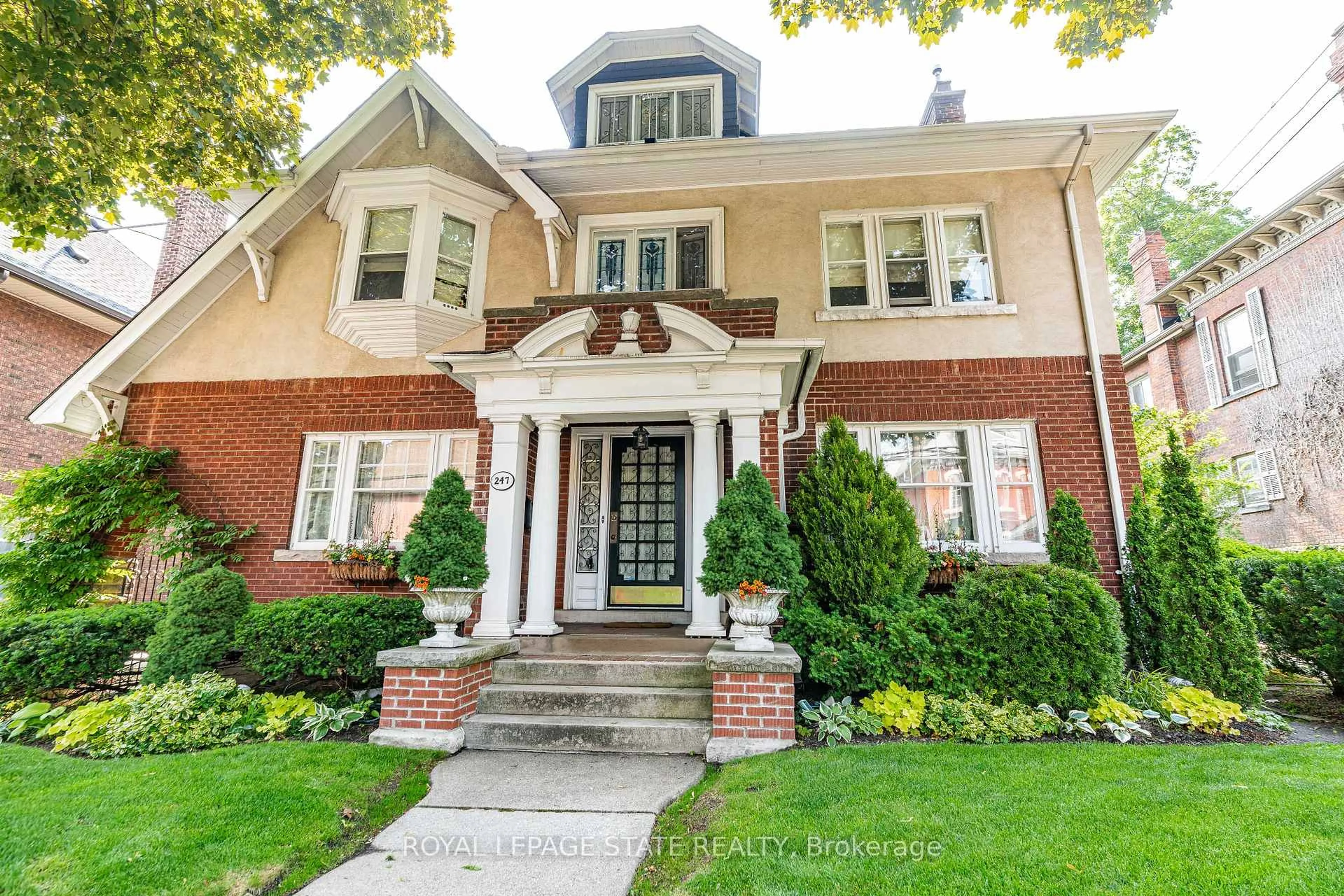 Home with brick exterior material, street for 247 MacNab St, Hamilton Ontario L8P 3E2