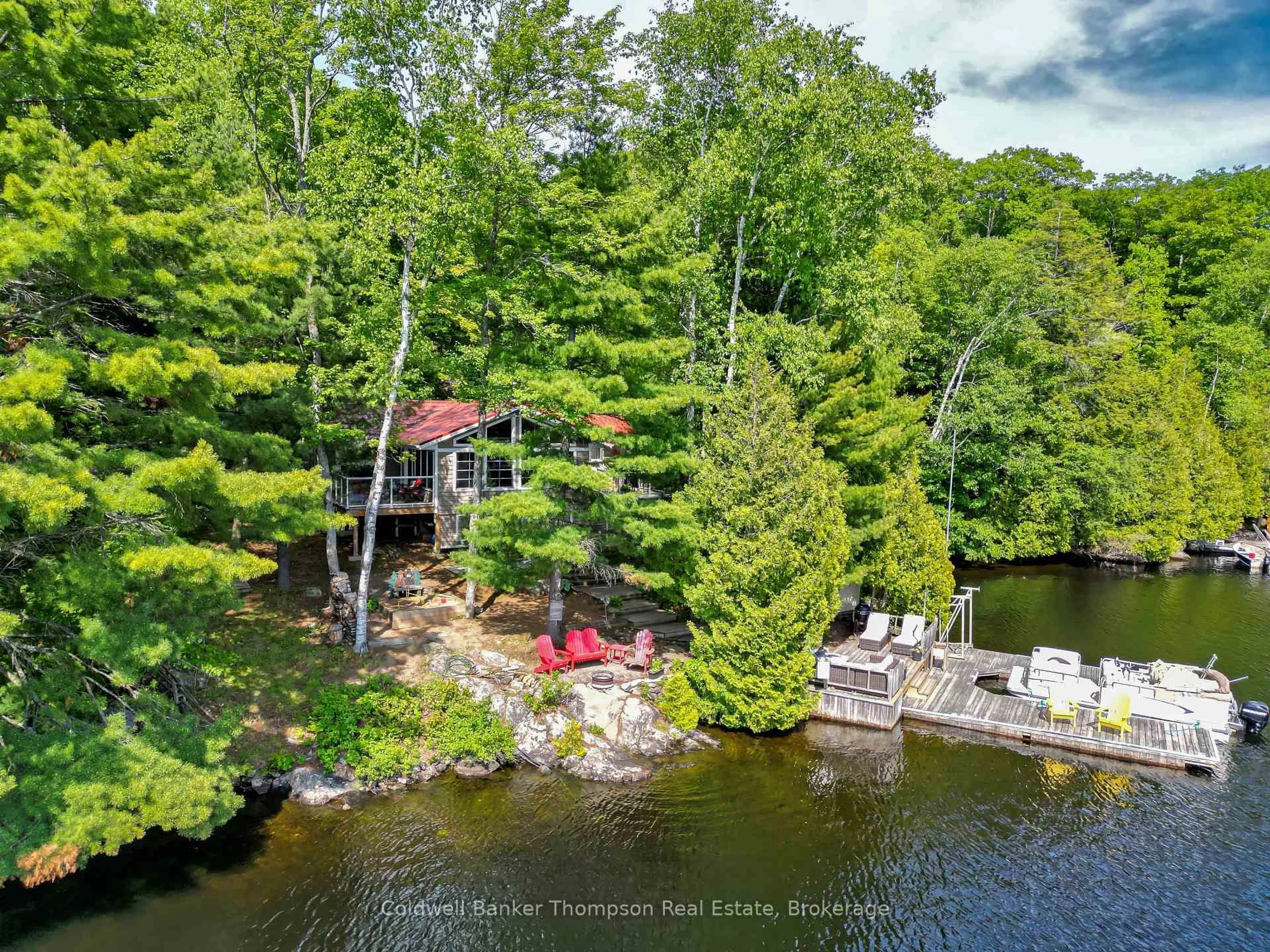 A pic from outside/outdoor area/front of a property/back of a property/a pic from drone, water/lake/river/ocean view for 92 RAVEN LAKE, Lake of Bays Ontario P0A 1E0