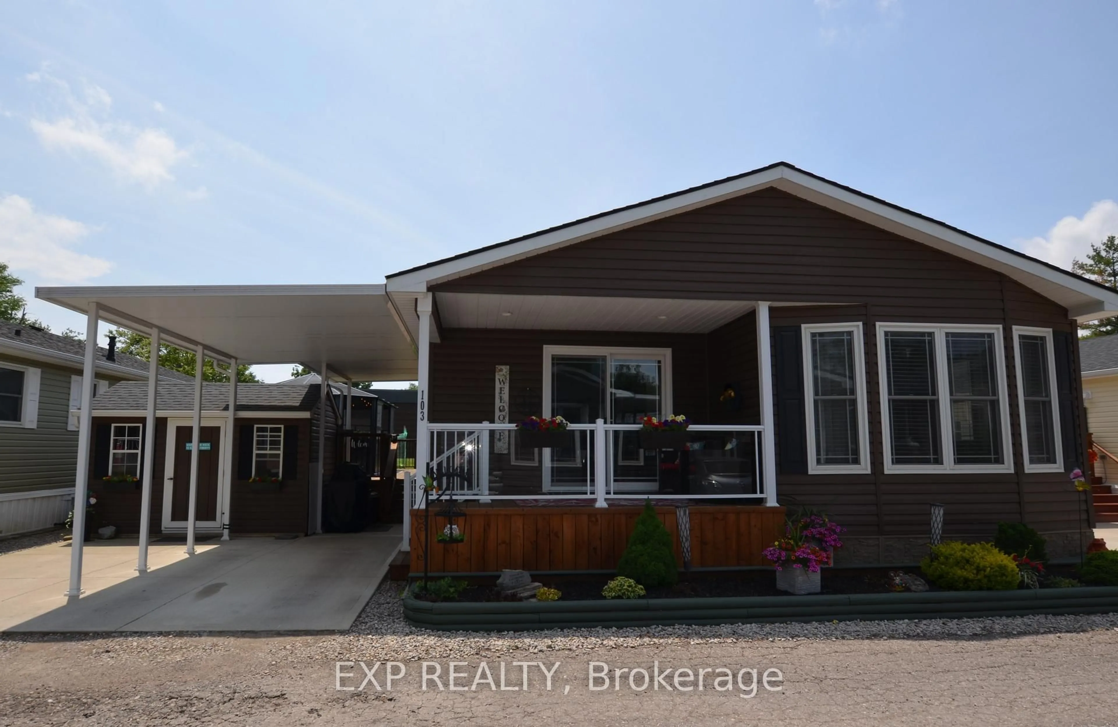 Home with vinyl exterior material, street for 22790 Amiens Rd #103, Middlesex Centre Ontario N0L 1R0