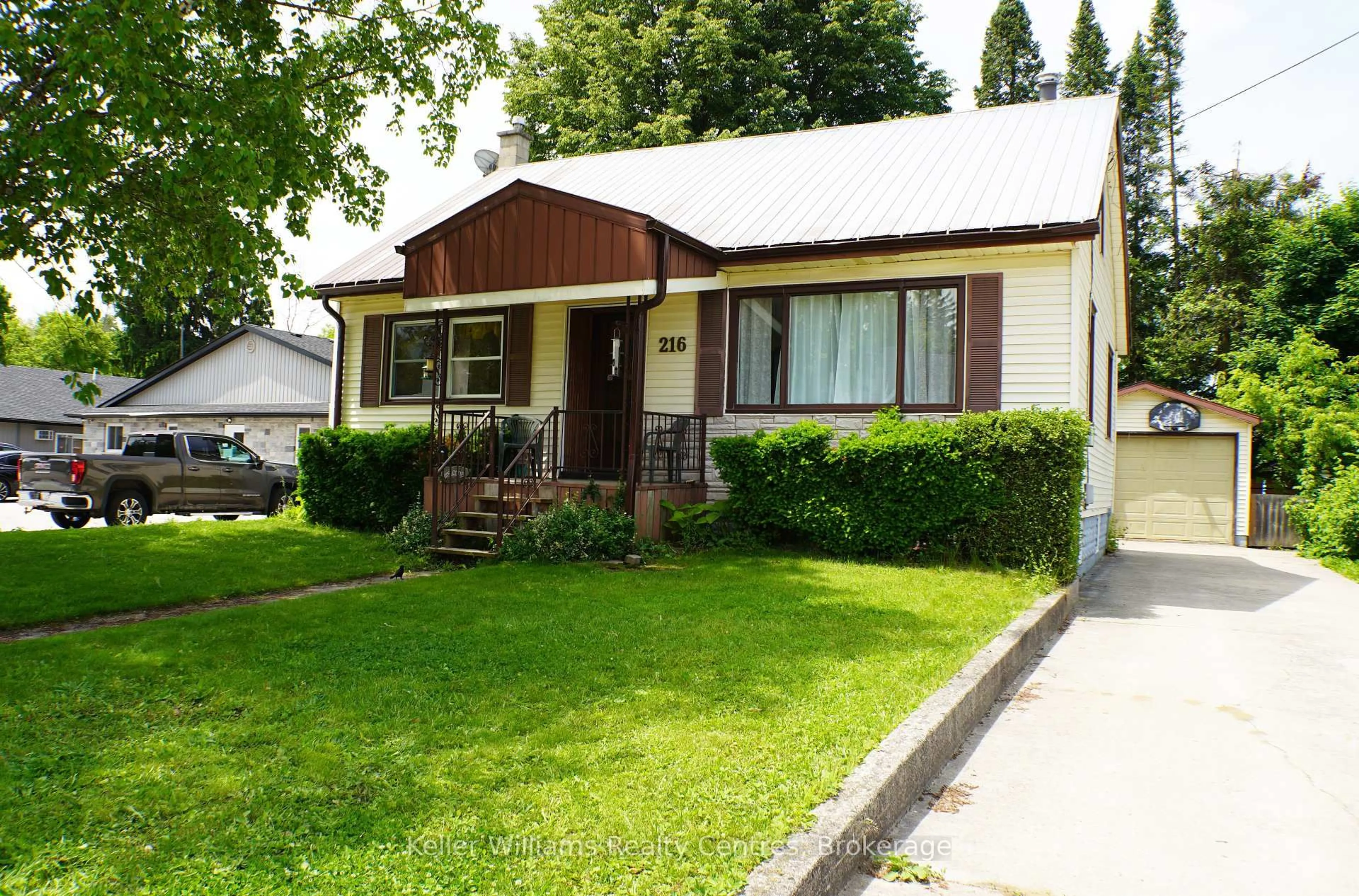 Home with vinyl exterior material, street for 216 Queen St, West Grey Ontario N0G 1R0