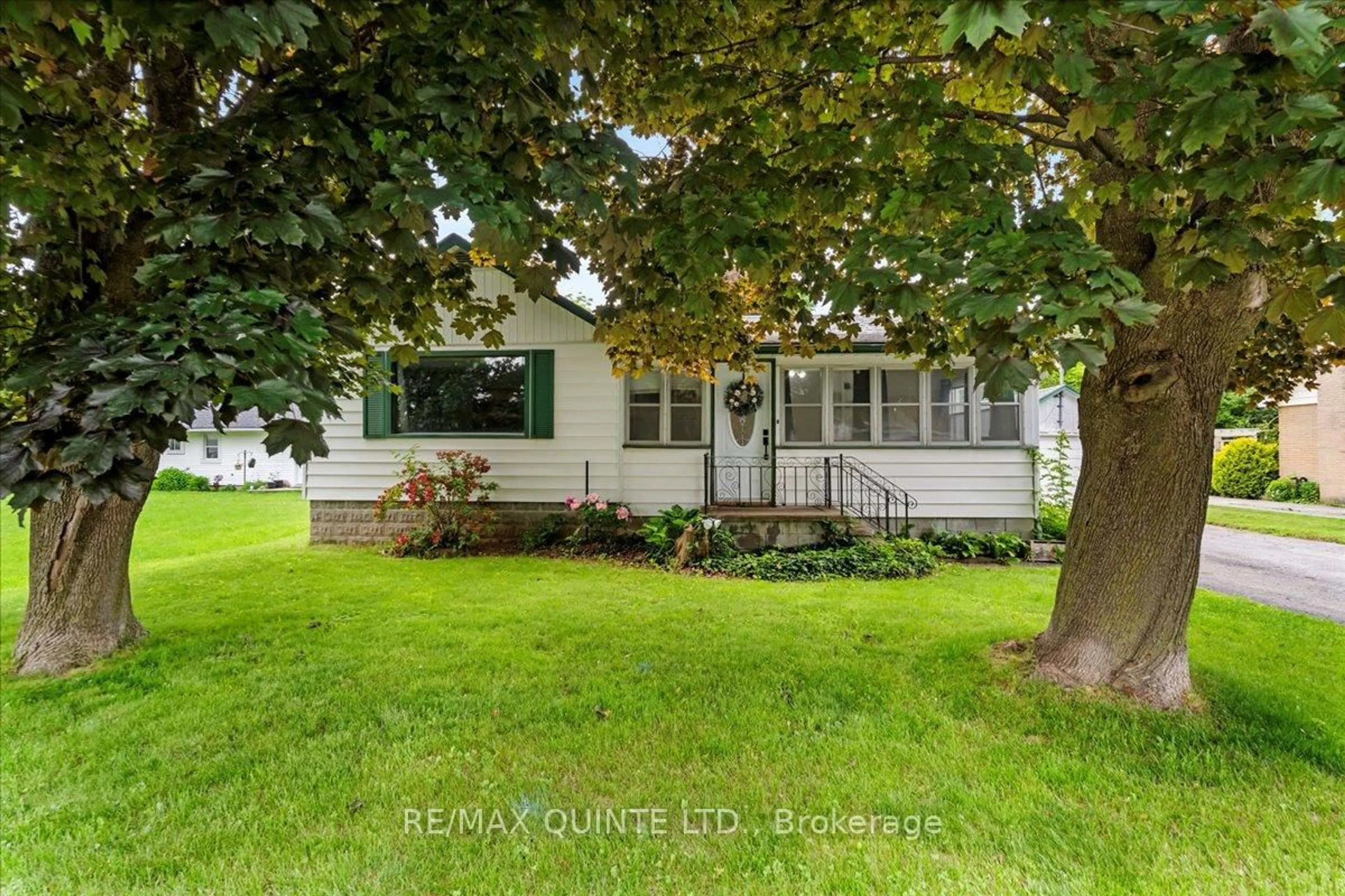 A pic from outside/outdoor area/front of a property/back of a property/a pic from drone, street for 48 Paul St, Prince Edward County Ontario K0K 2T0