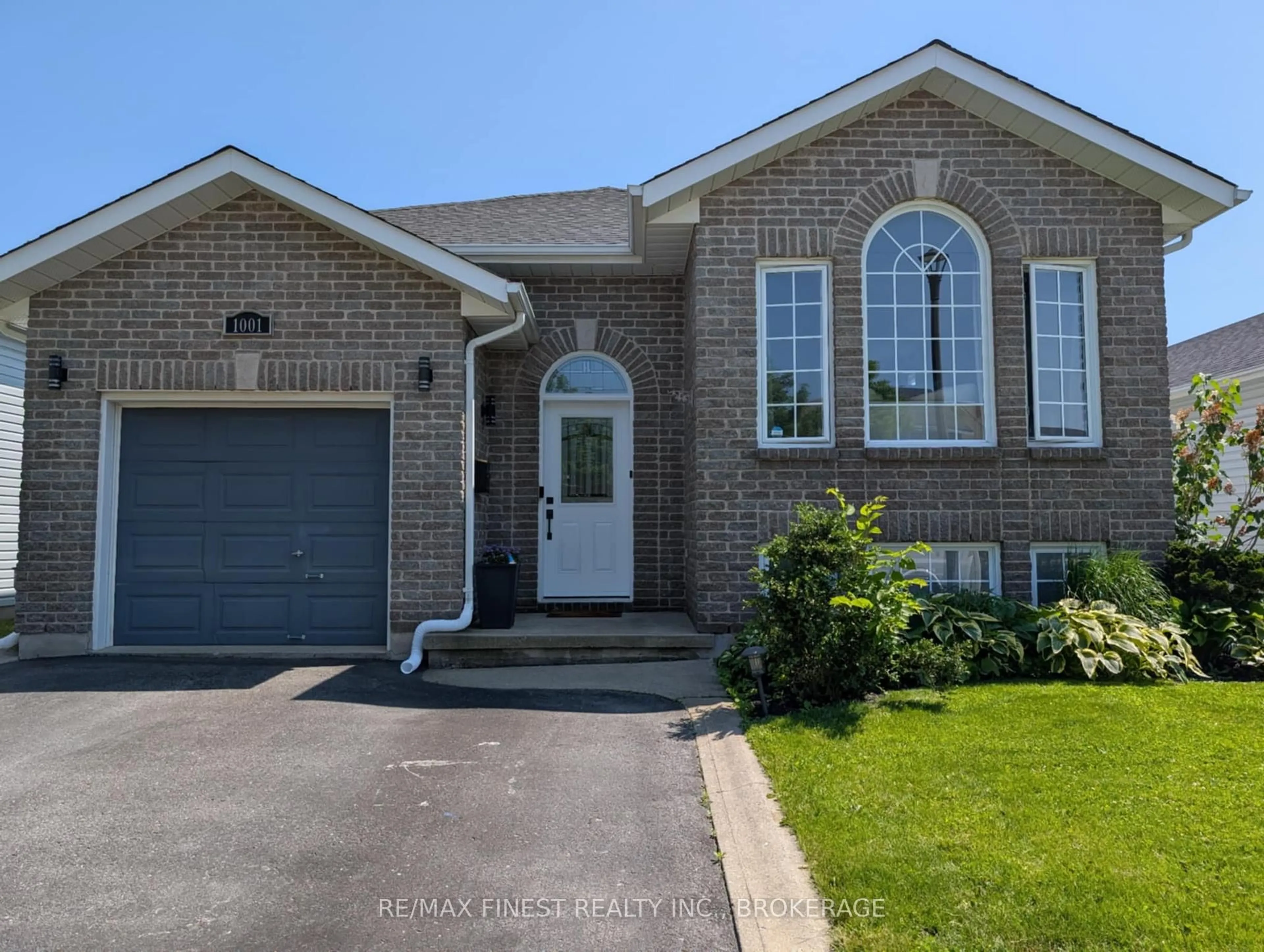 Home with brick exterior material, street for 1001 Bluffwood Ave, Kingston Ontario K7K 7K6