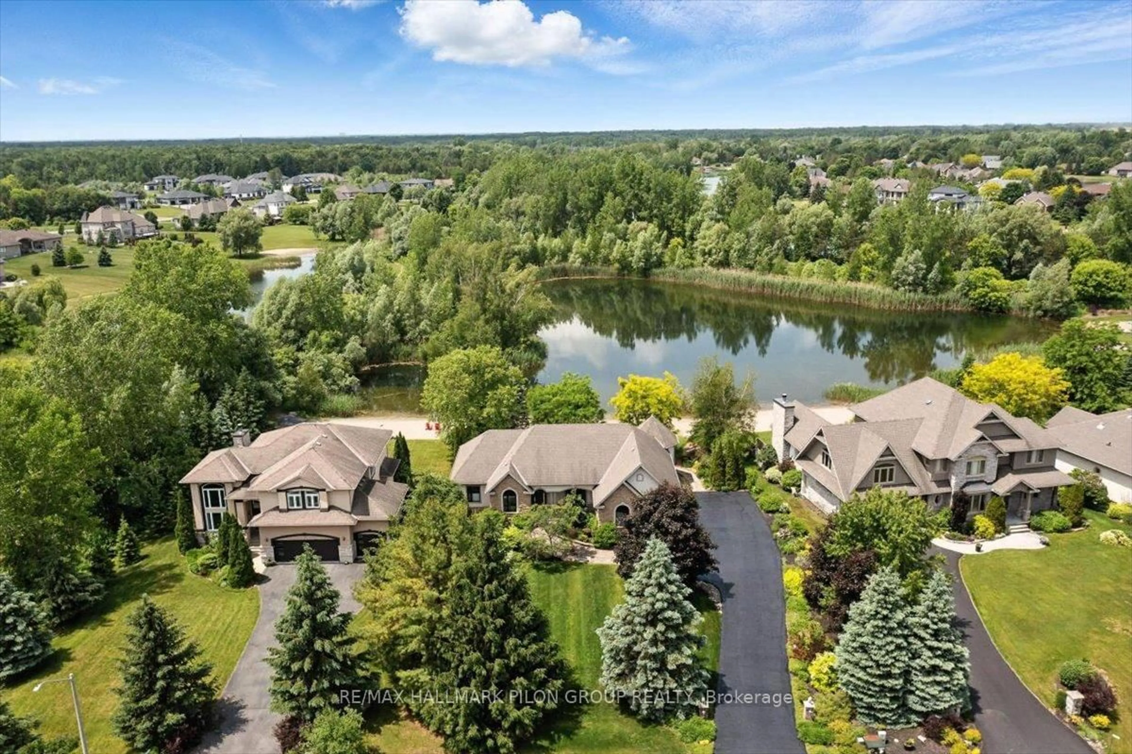 A pic from outside/outdoor area/front of a property/back of a property/a pic from drone, water/lake/river/ocean view for 6893 Sparkling Lake Way, Greely Ontario K4P 1R7