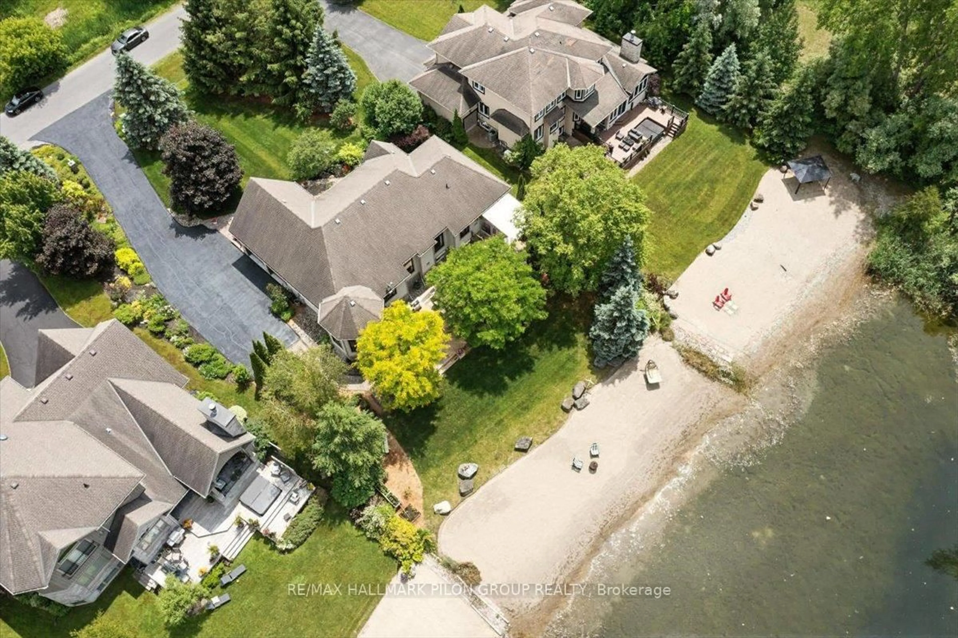 A pic from outside/outdoor area/front of a property/back of a property/a pic from drone, water/lake/river/ocean view for 6893 Sparkling Lake Way, Greely Ontario K4P 1R7