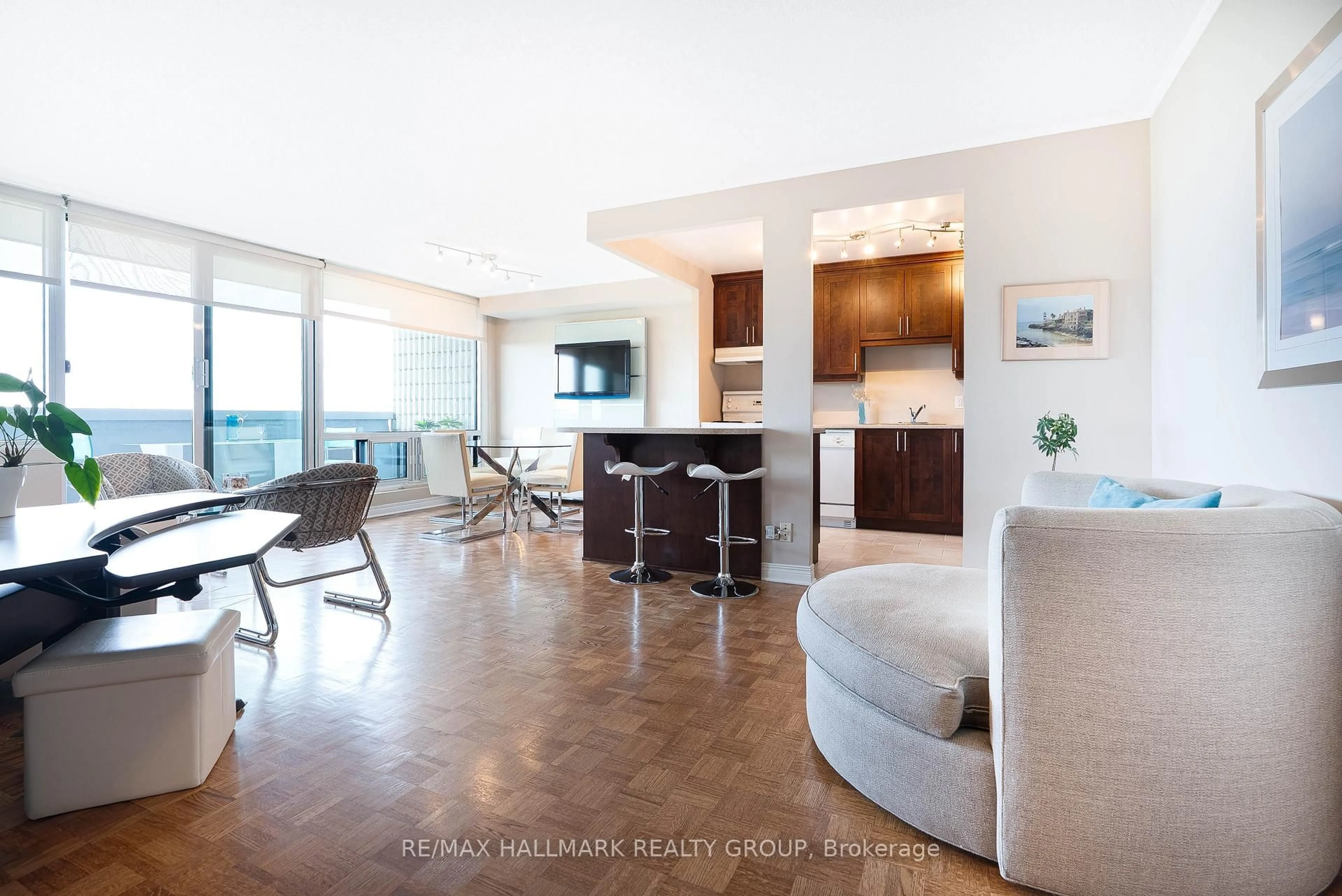 Living room with furniture, ceramic/tile floor for 265 Poulin Ave #1011, Ottawa Ontario K2B 7Y8