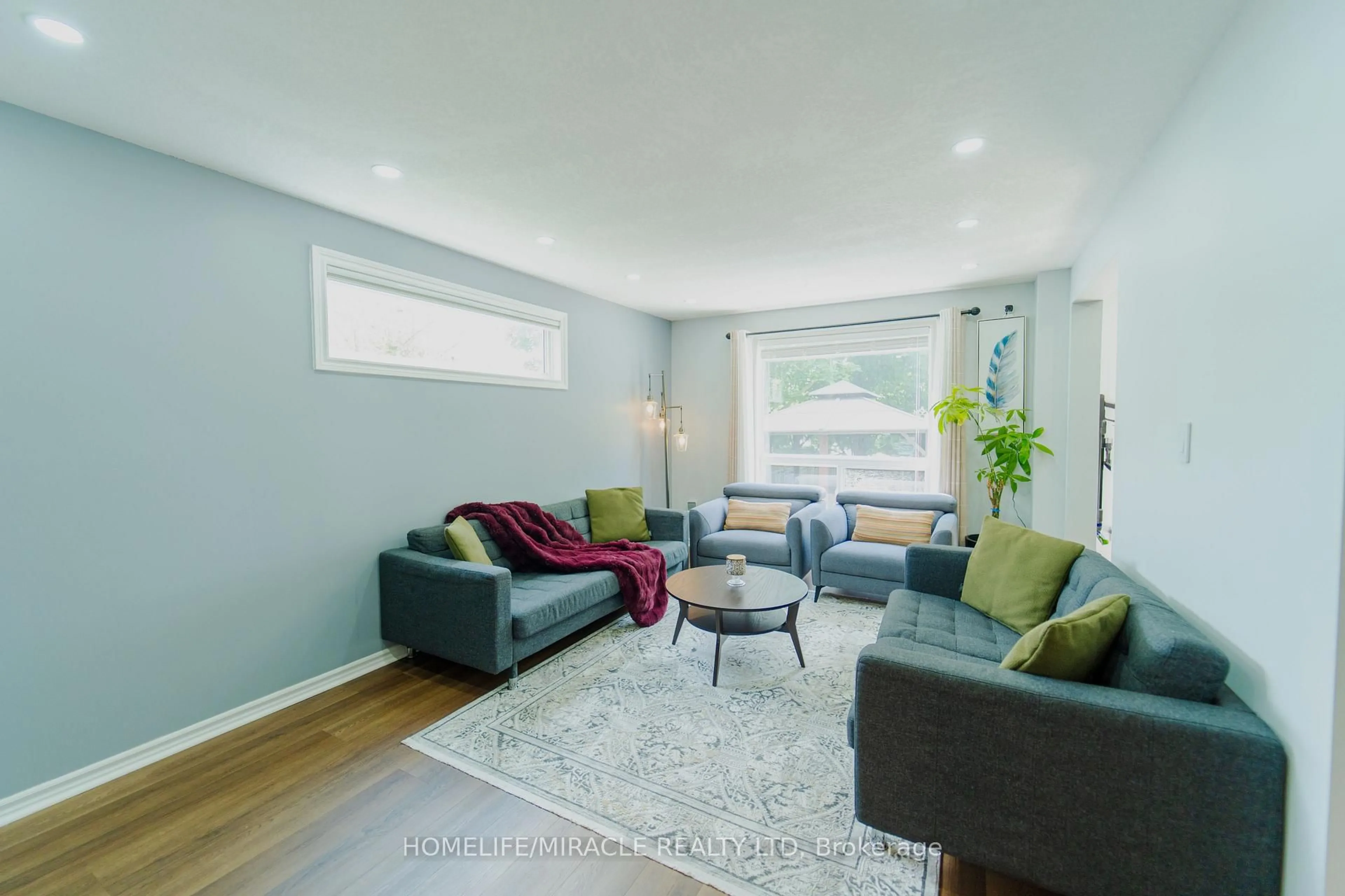 Living room with furniture, wood/laminate floor for 3 Marcy Cres, Cambridge Ontario N3C 4H5