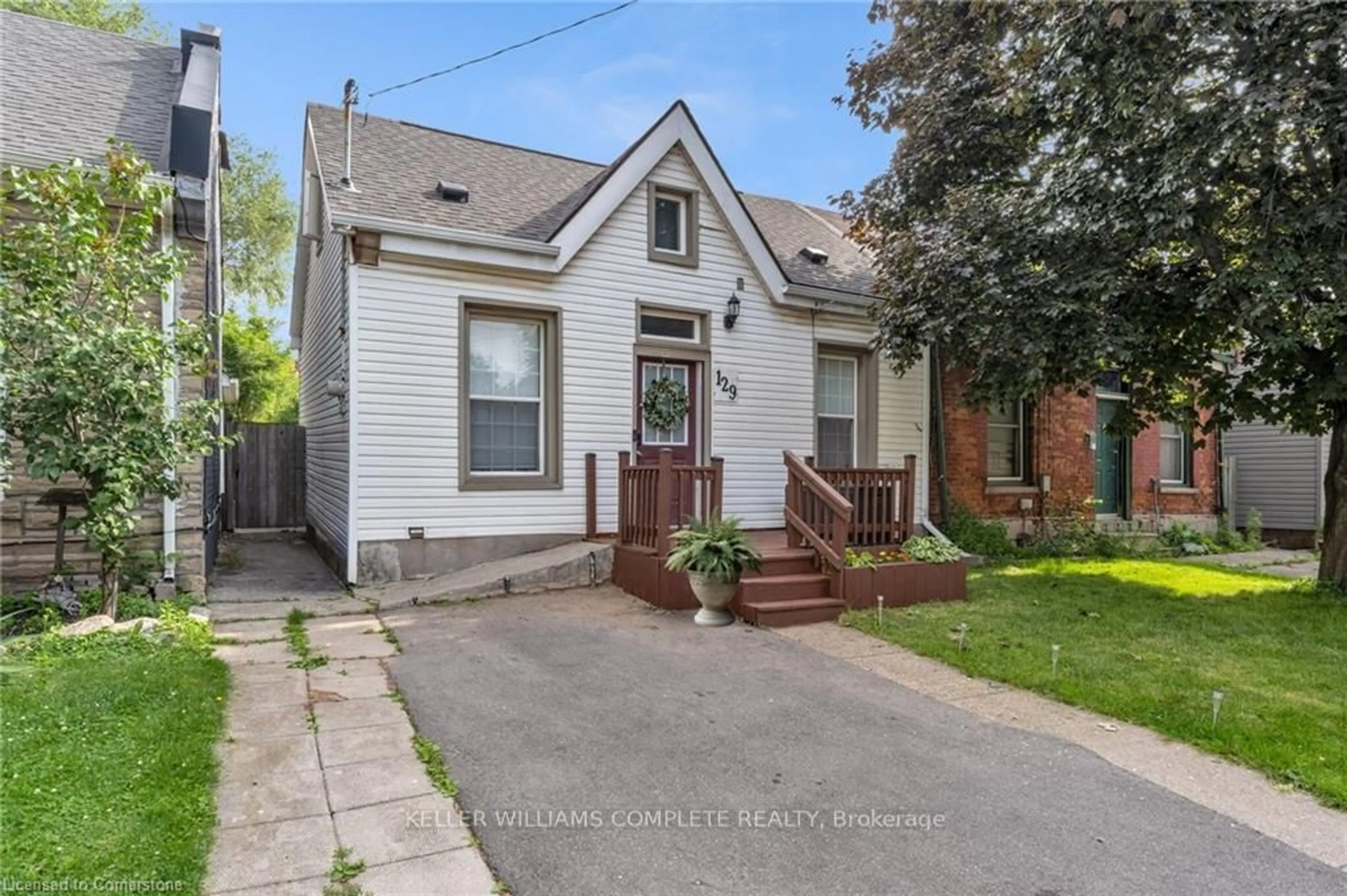 Home with brick exterior material, street for 129 Birge St, Hamilton Ontario L8L 3L6