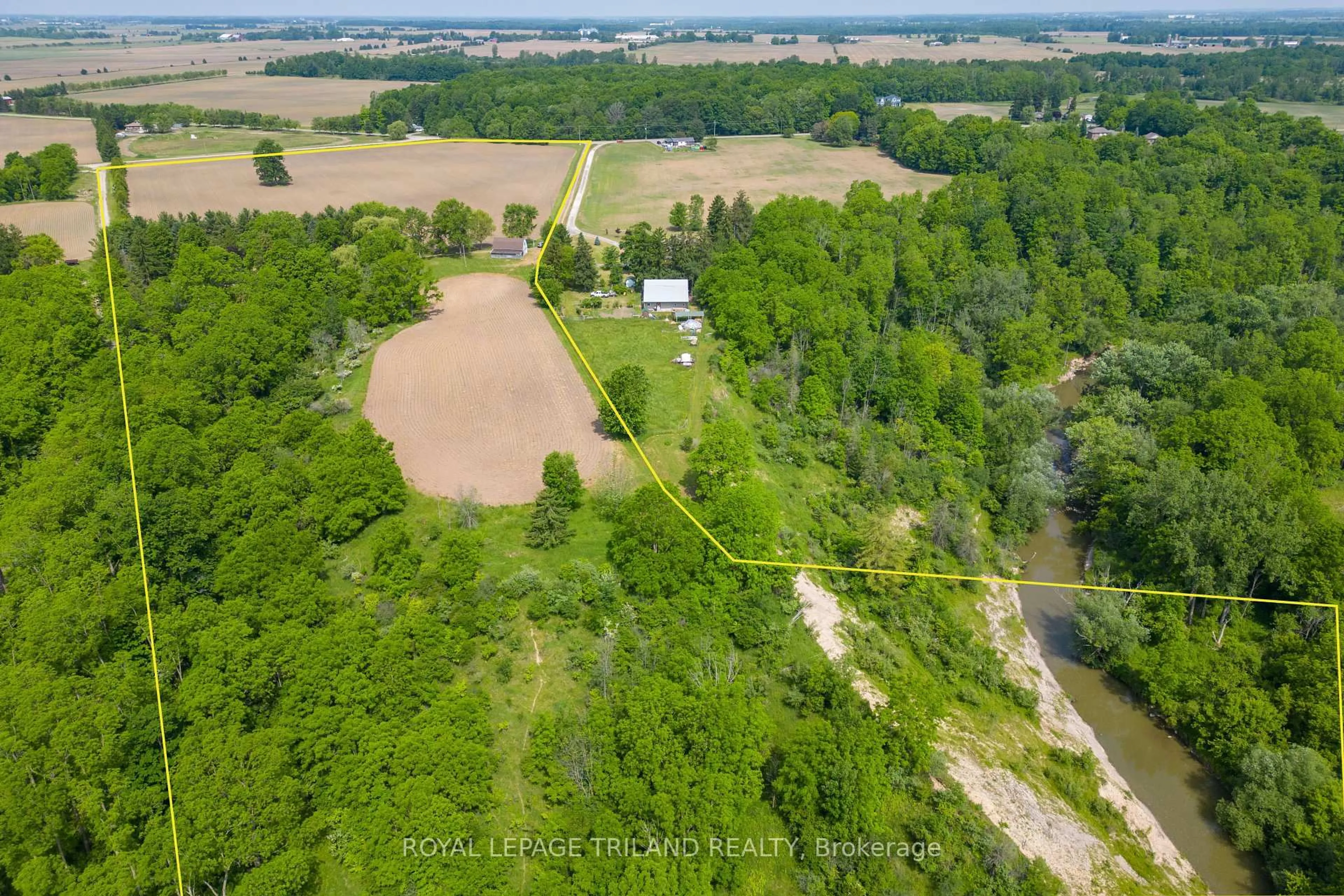 A pic from outside/outdoor area/front of a property/back of a property/a pic from drone, forest/trees view for 39339 Bush Line, St. Thomas Ontario N5P 3S9