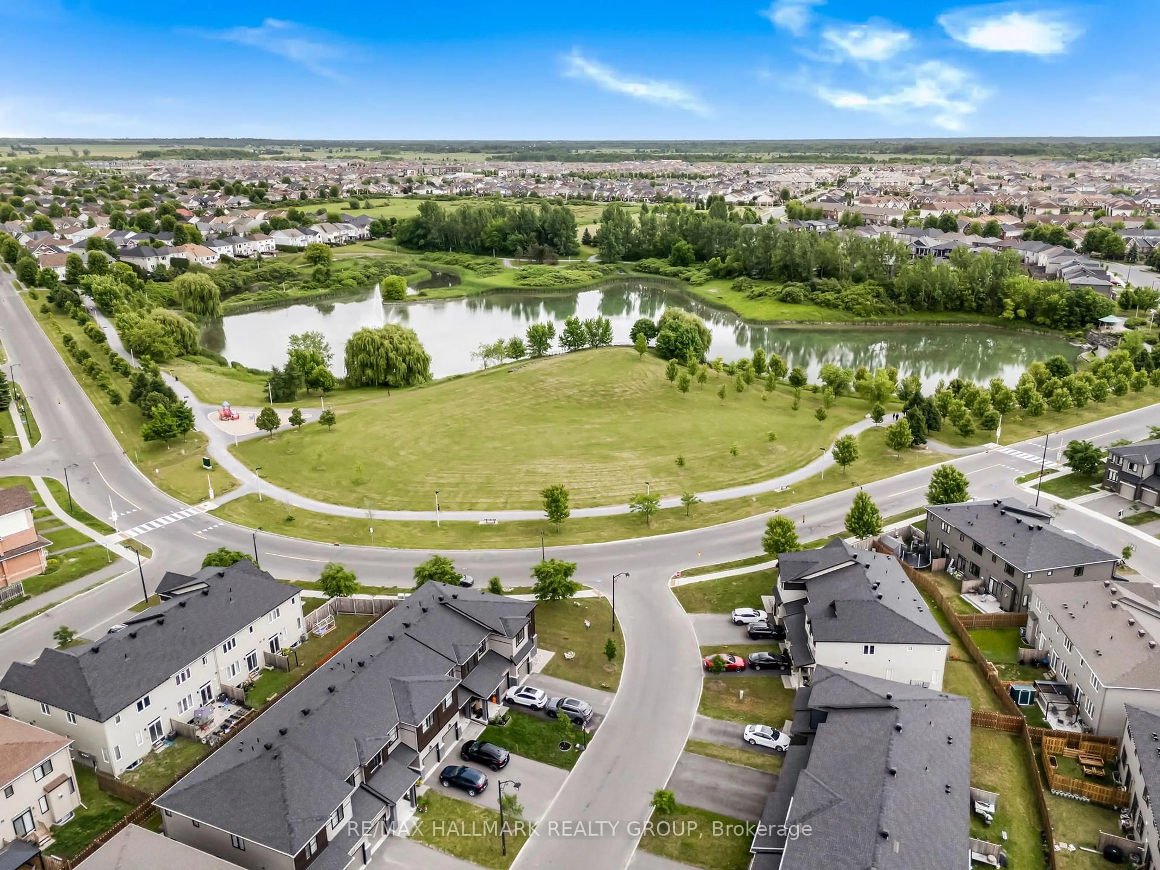 A pic from outside/outdoor area/front of a property/back of a property/a pic from drone, water/lake/river/ocean view for 833 Dynasty St, Ottawa Ontario K4A 4T7