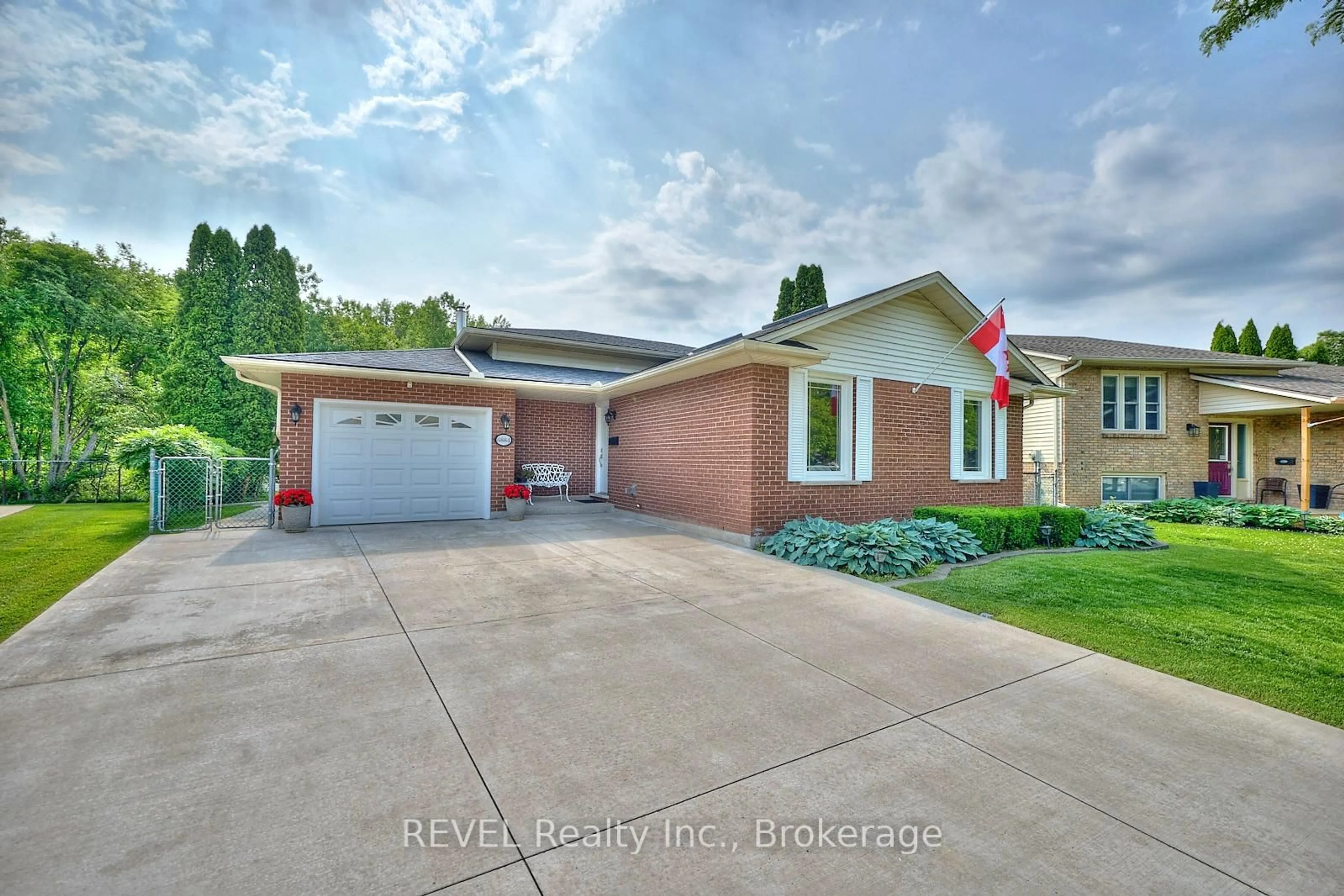 Home with brick exterior material, street for 6884 Devon Dr, Niagara Falls Ontario L2H 2S9