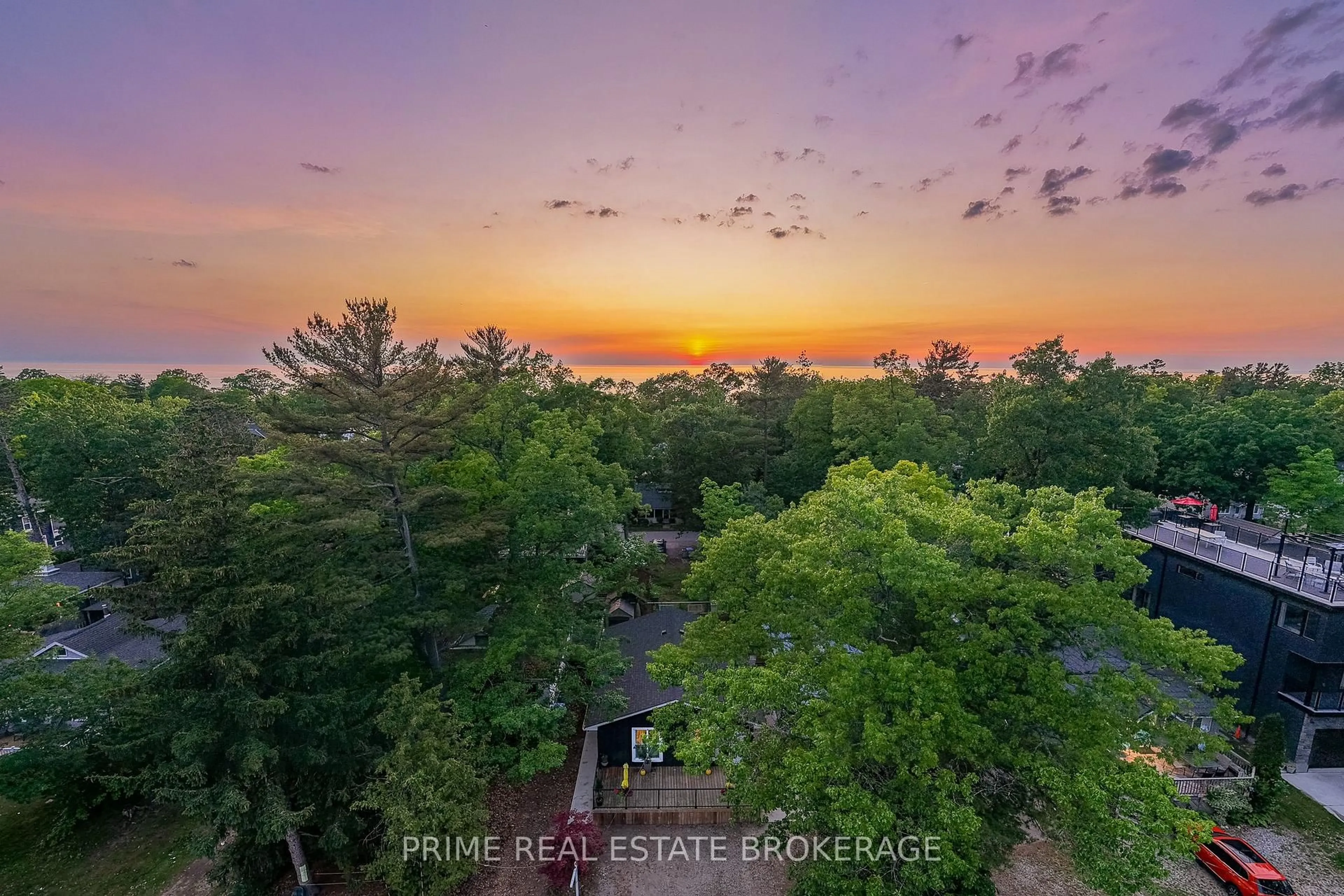 A pic from outside/outdoor area/front of a property/back of a property/a pic from drone, forest/trees view for 33 Elmwood Ave, Lambton Shores Ontario N0M 1T0