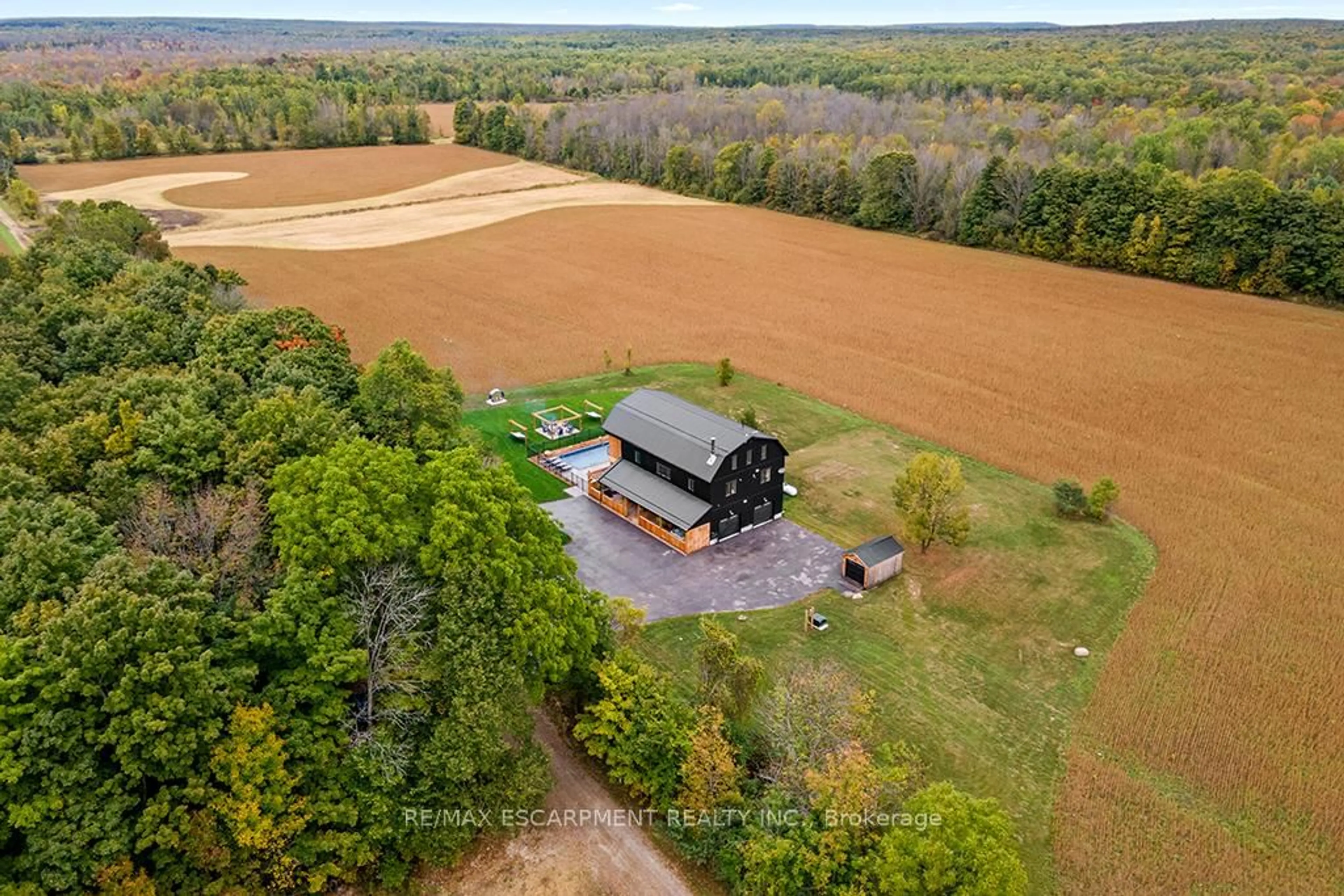 A pic from outside/outdoor area/front of a property/back of a property/a pic from drone, unknown for 402075 Grey Road 17, Georgian Bluffs Ontario N0H 2T0