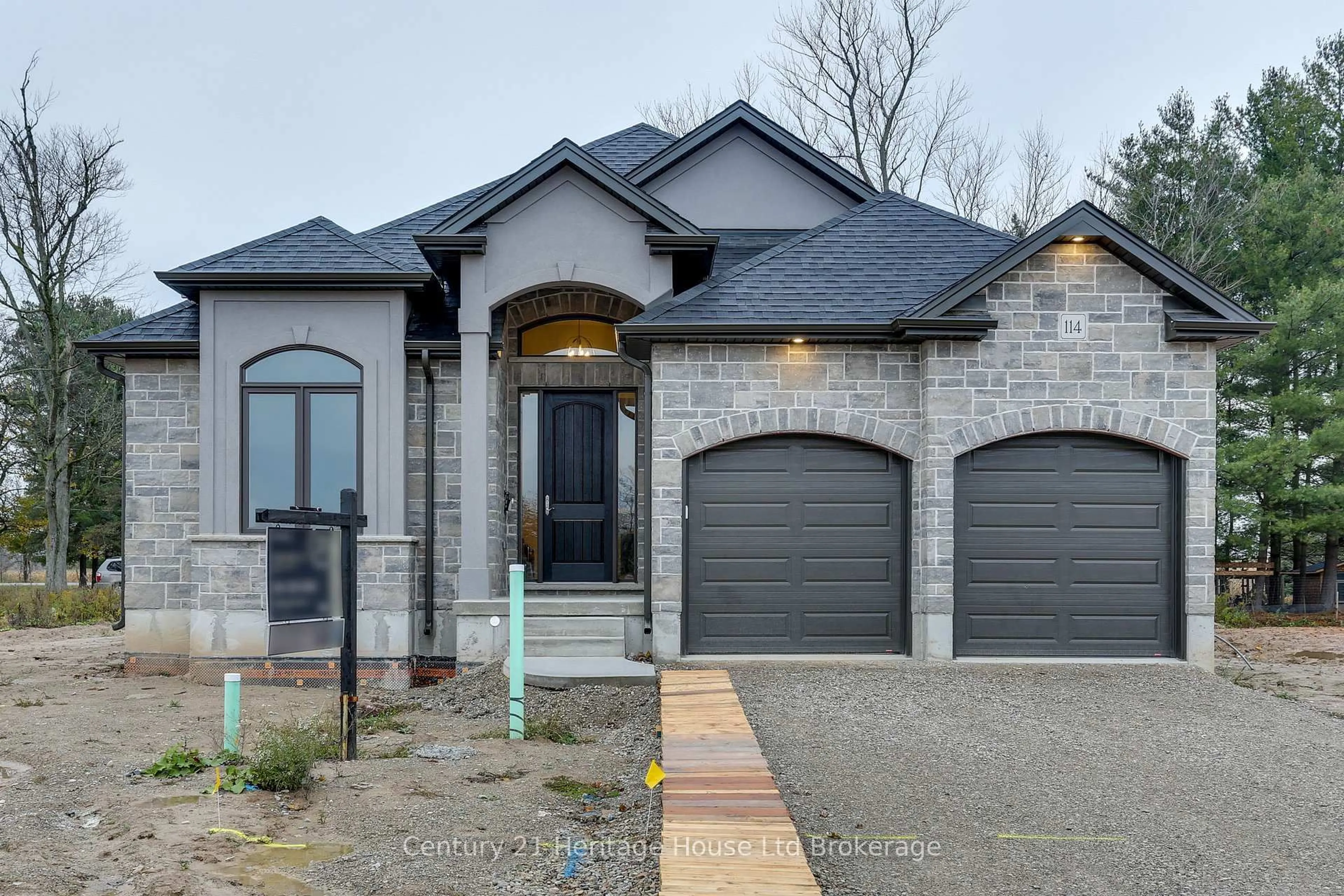 Home with brick exterior material, street for 114 Beech Blvd, Tillsonburg Ontario N4G 5S1